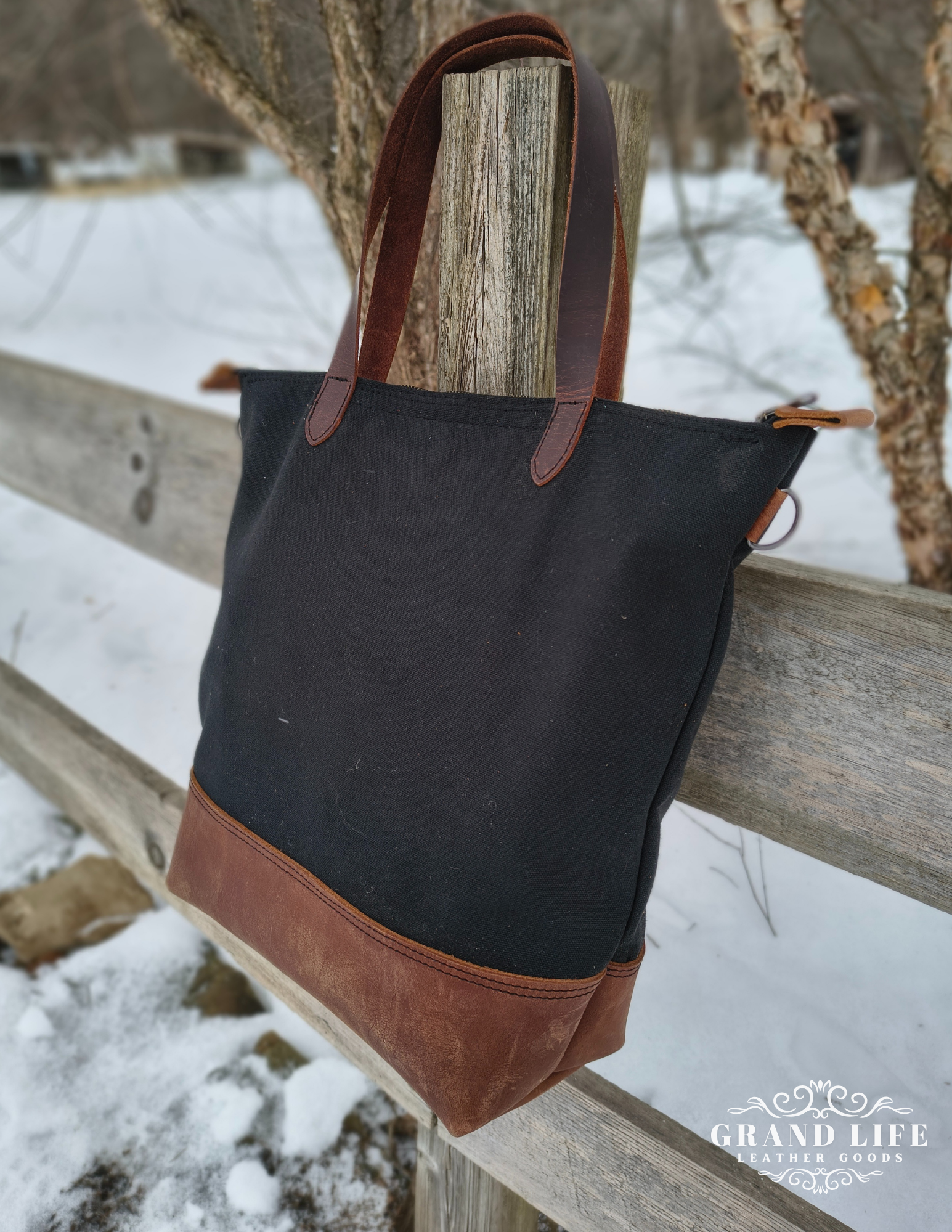 black canvas leather tote bag back.png