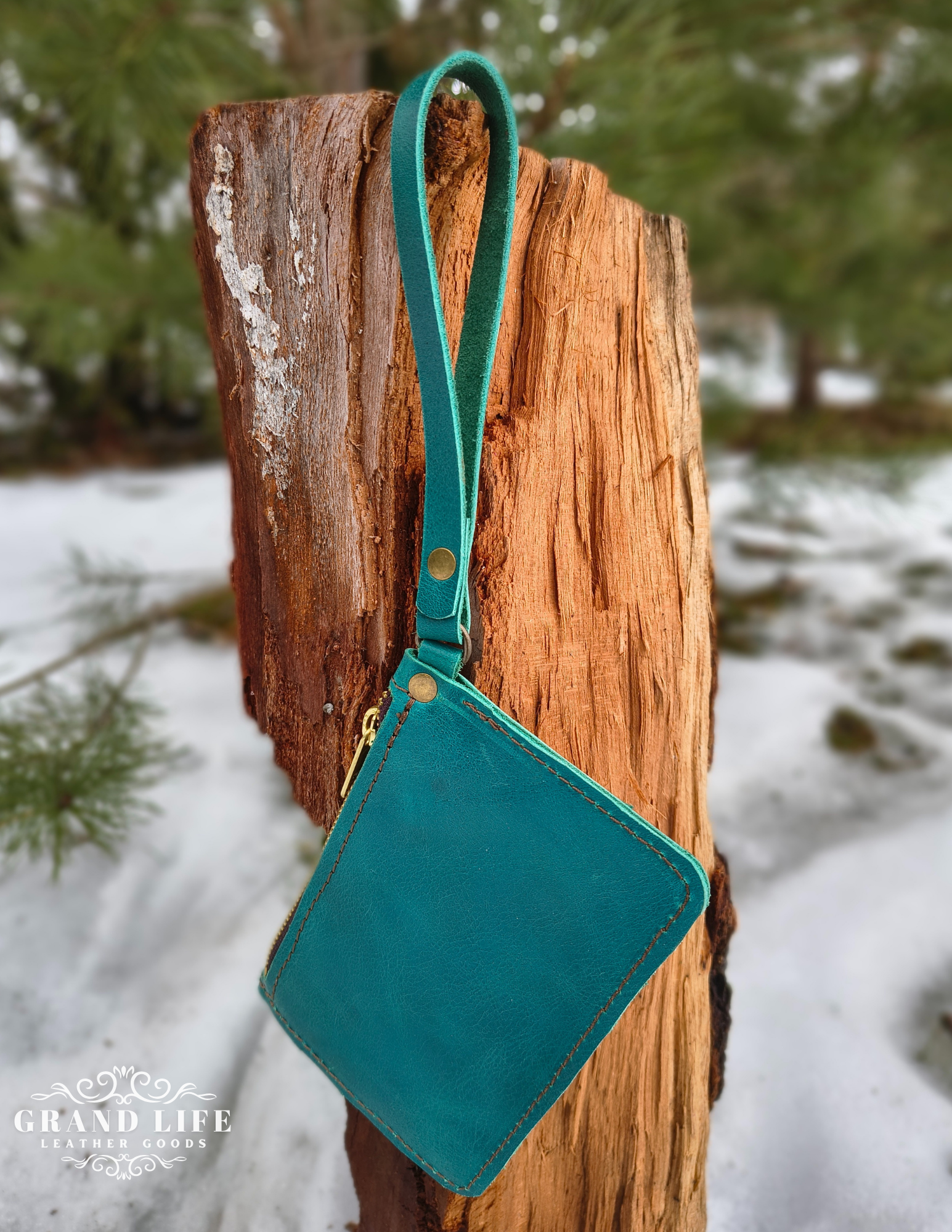 handcrafted leather zip wallet teal back.png