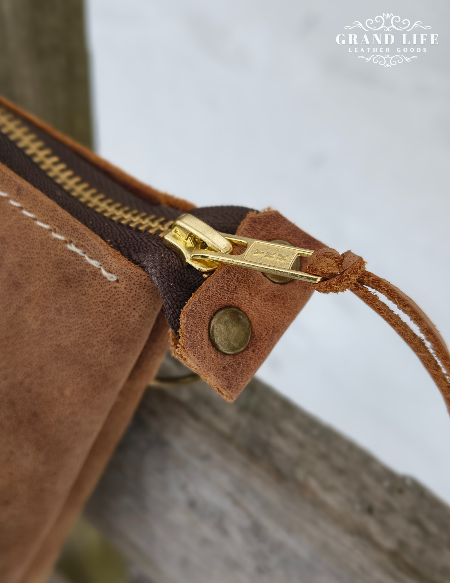 handcrafted leather tote zipper top conceal carry detail of zipper.png