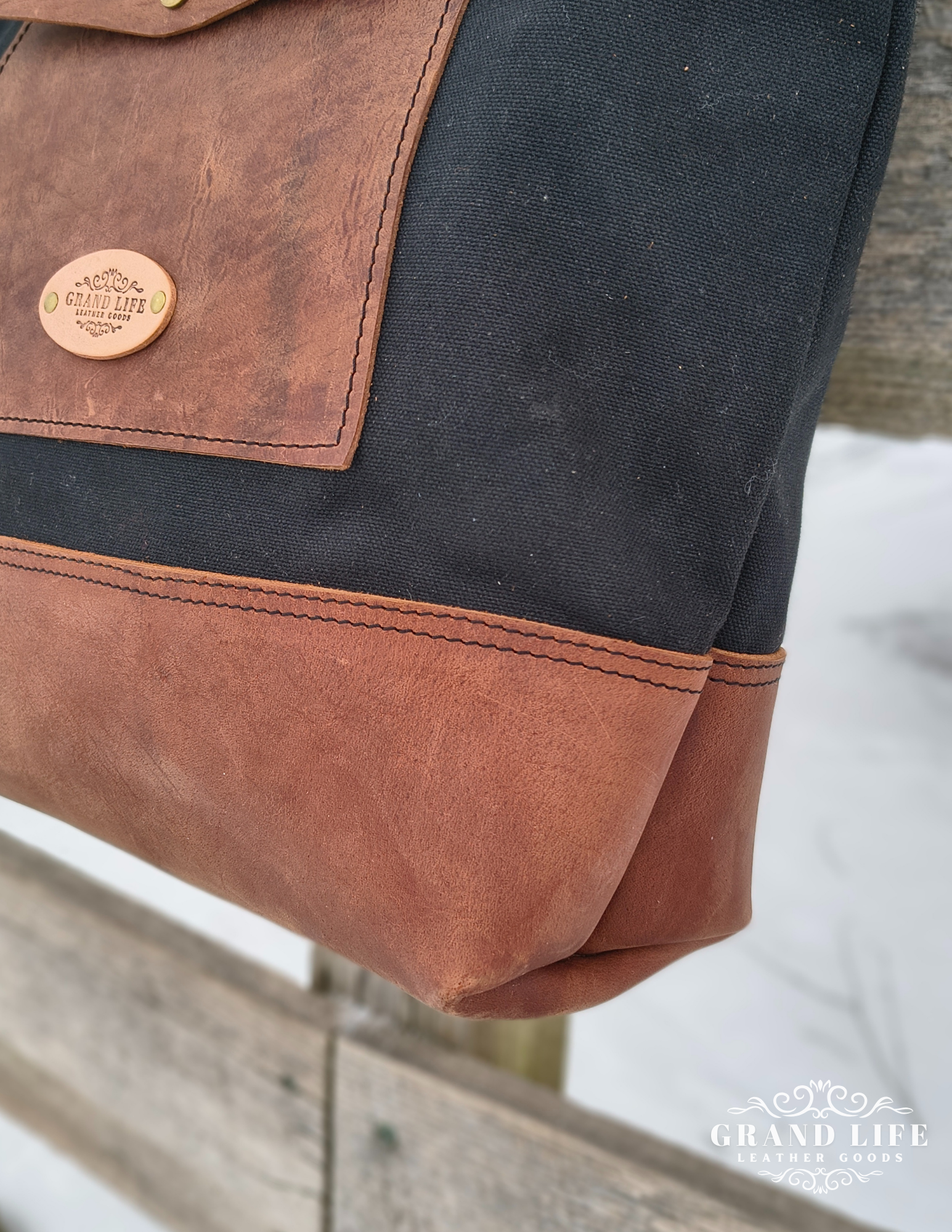 black canvas leather tote bag detail.png