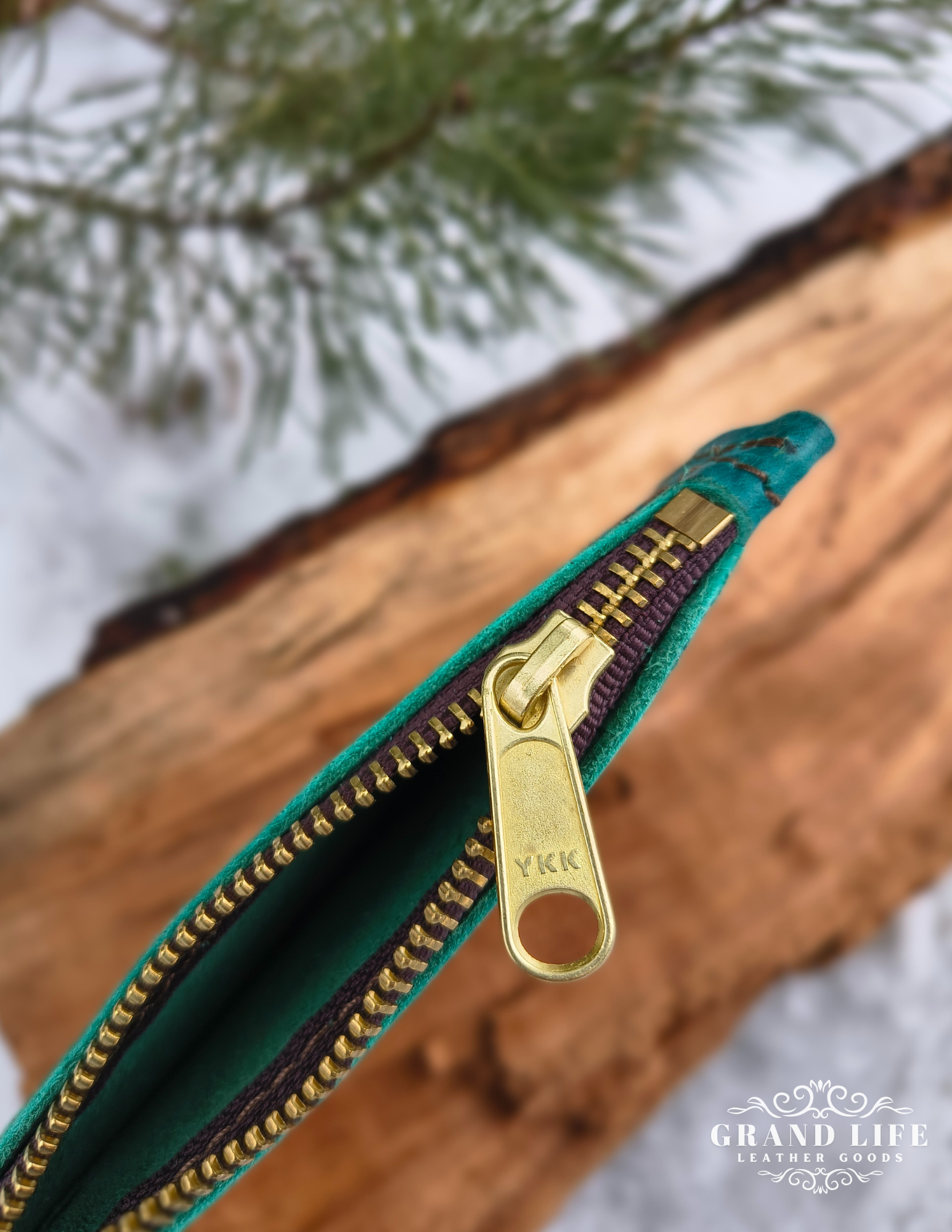 handcrafted leather zip wallet teal interior.png