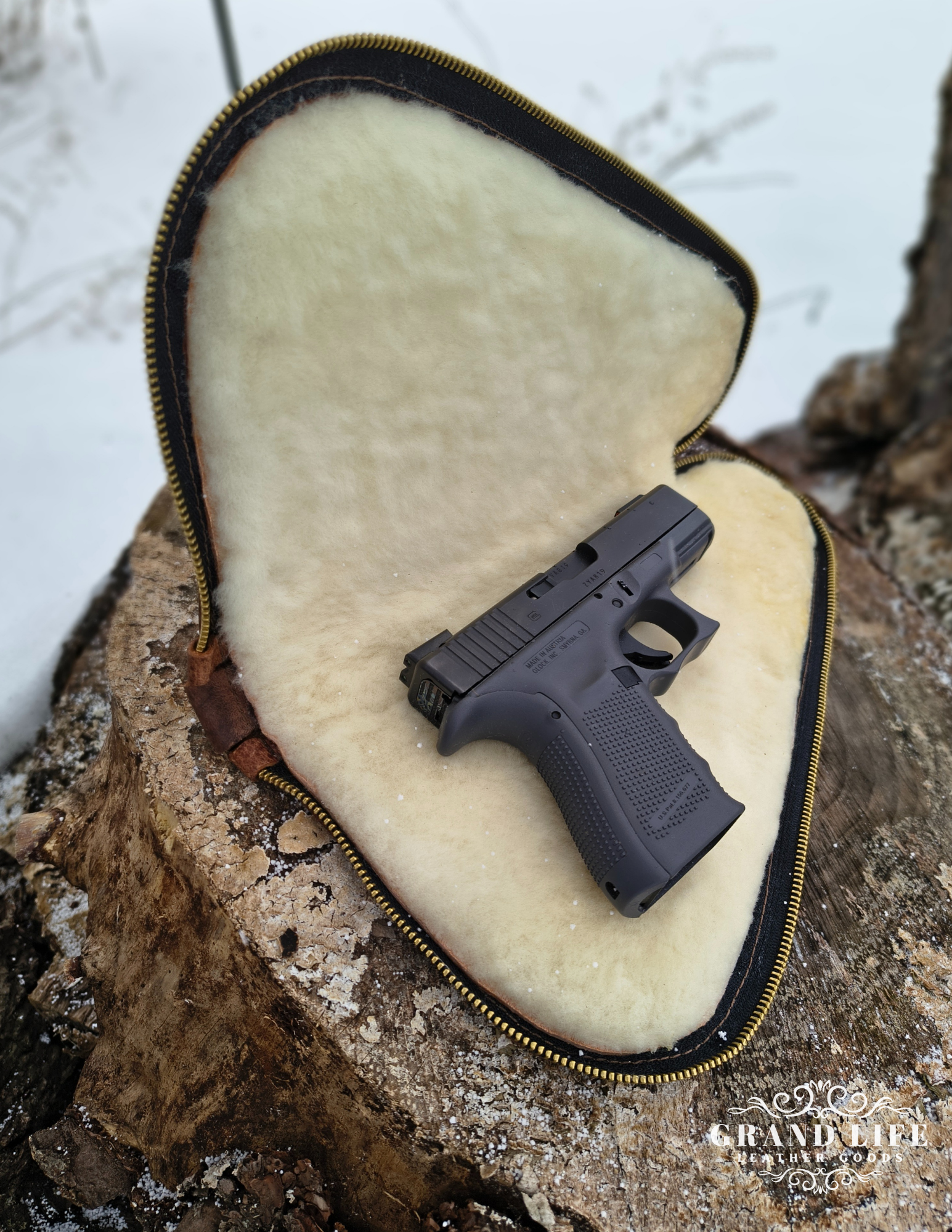 leather pistol case with wool lining open.png