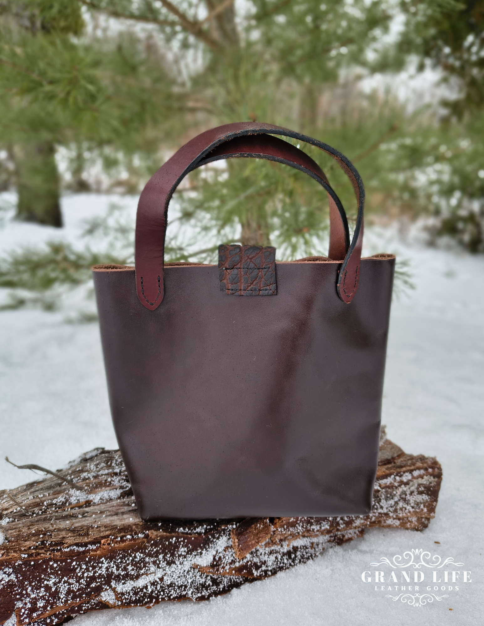 handcrafted leather purse with flap closure back brown.png