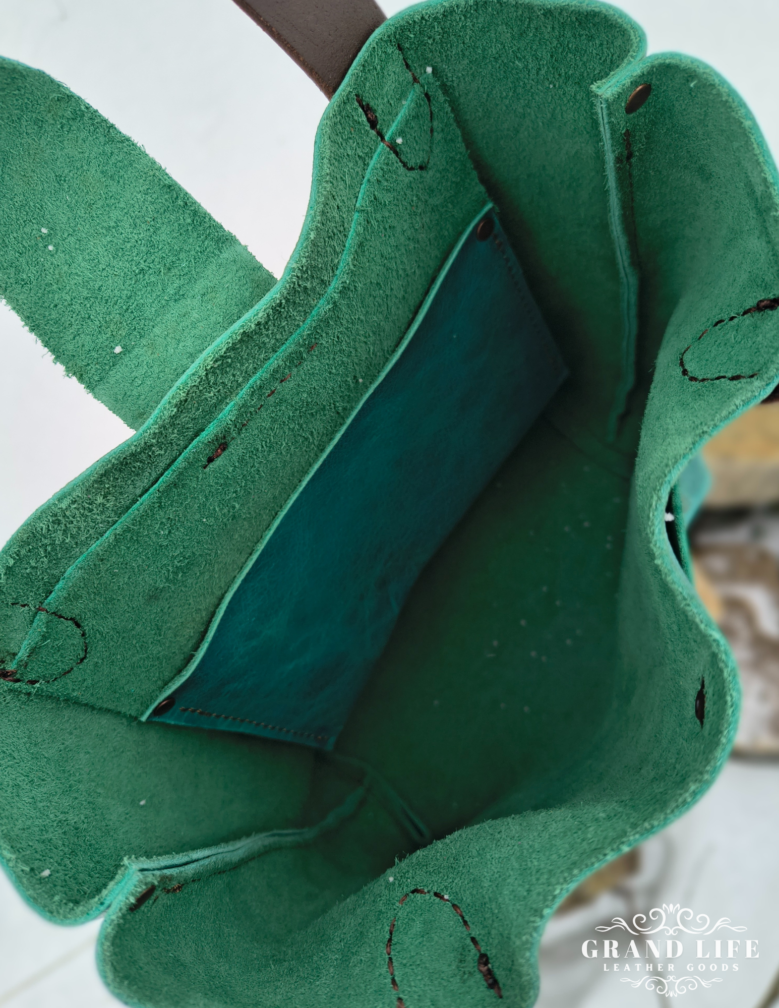 handcrafted leather purse with flap closure top interior.png