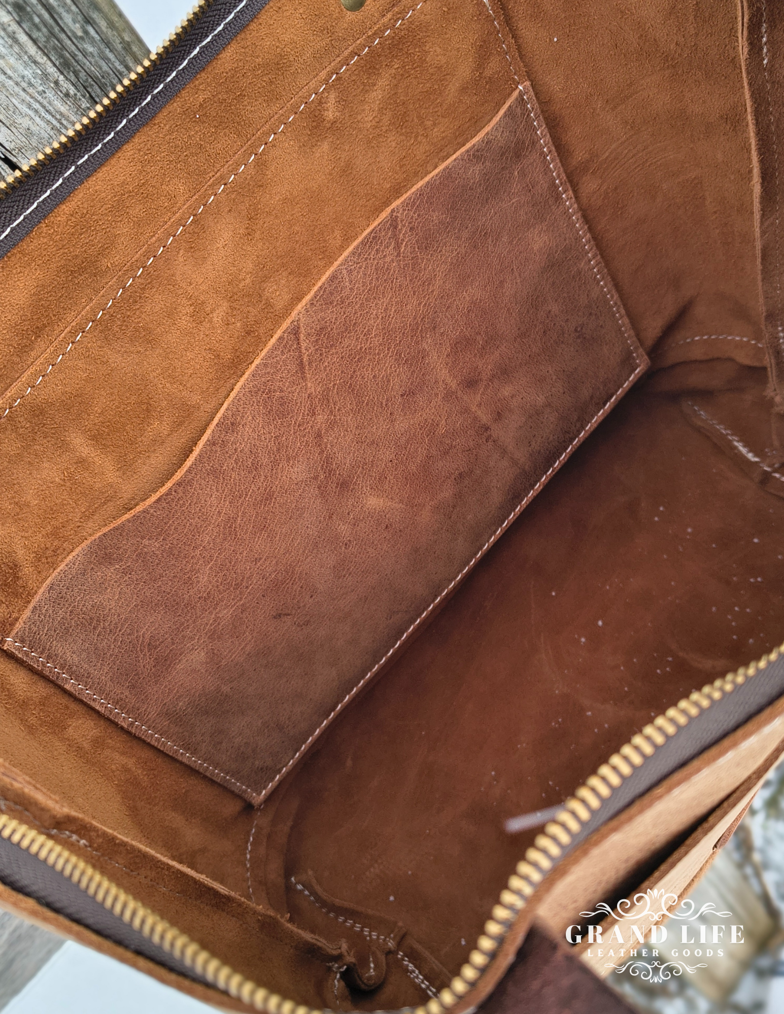 handcrafted leather tote zipper top conceal carry interior detail.png