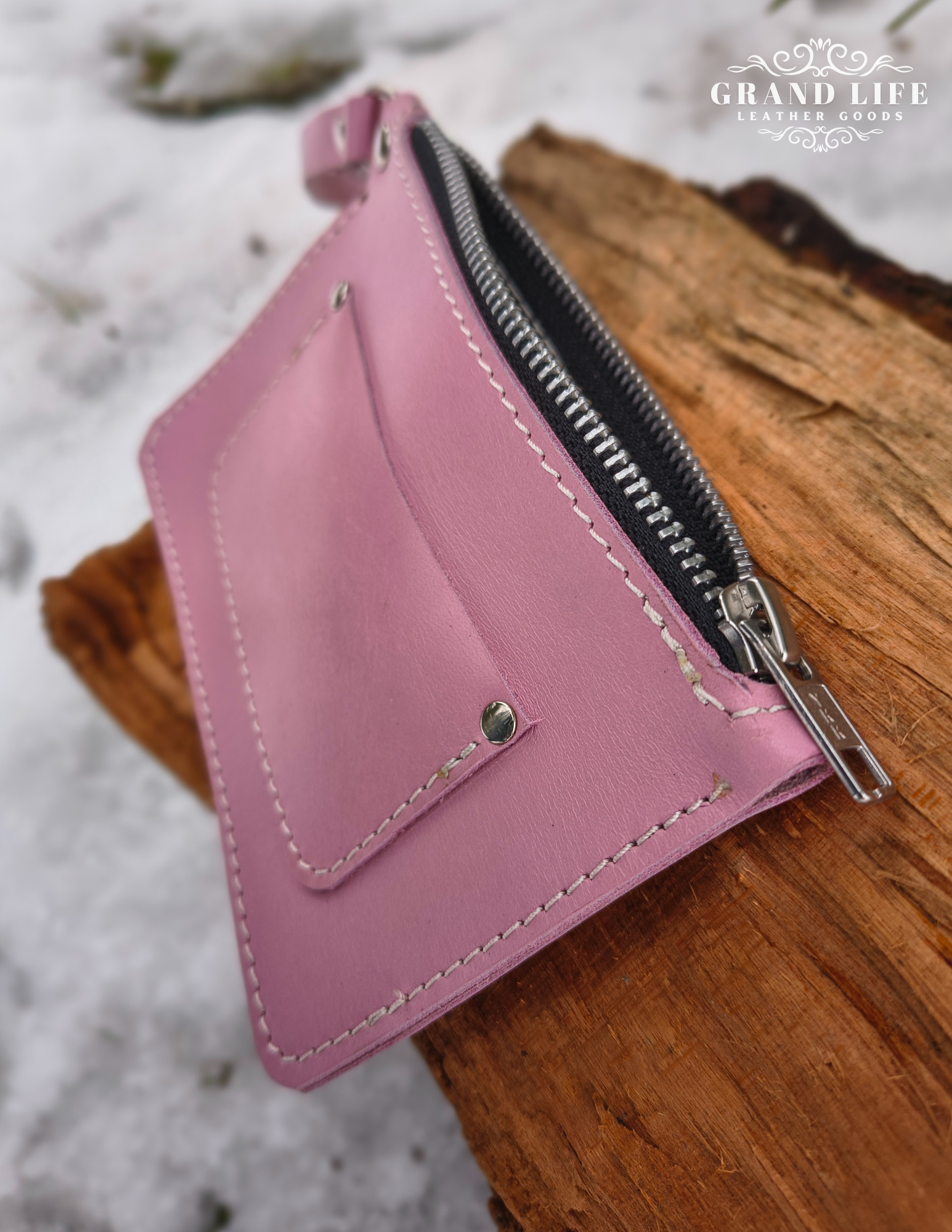 handcrafted leather zip wallet pink detail.png
