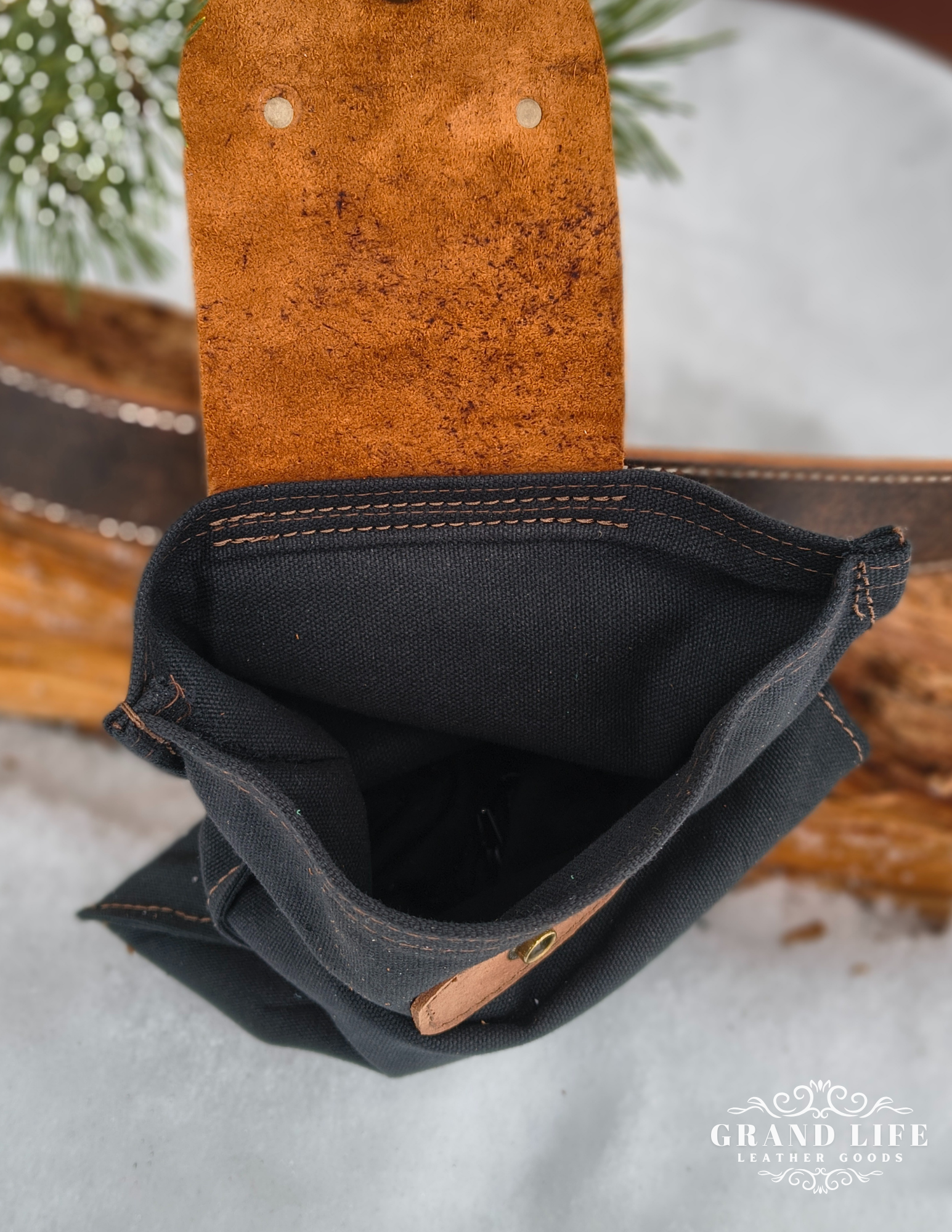 leather explorer pouch black canvas open bag inside.png