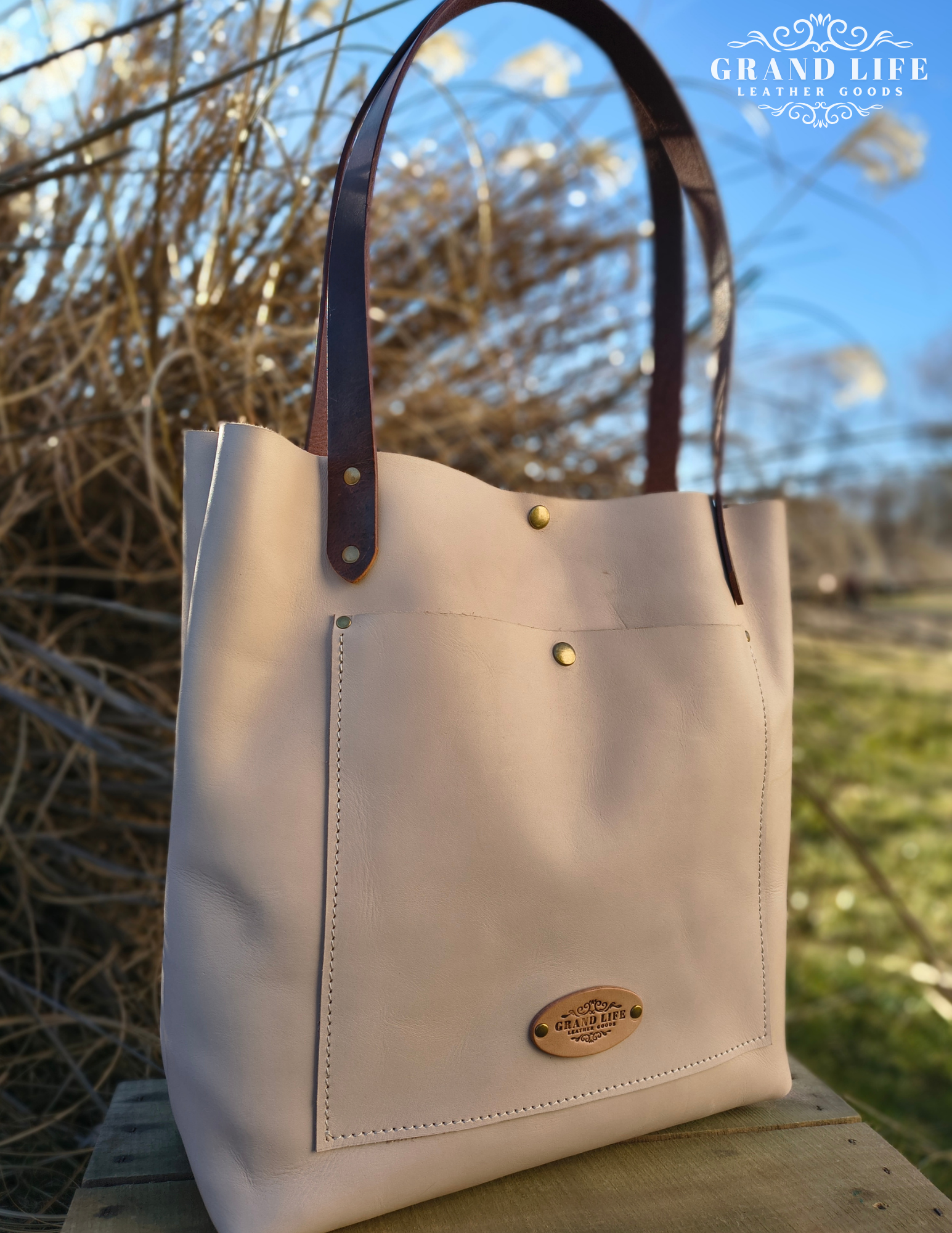 handcrafted leather carry all tote bag with snap top.png