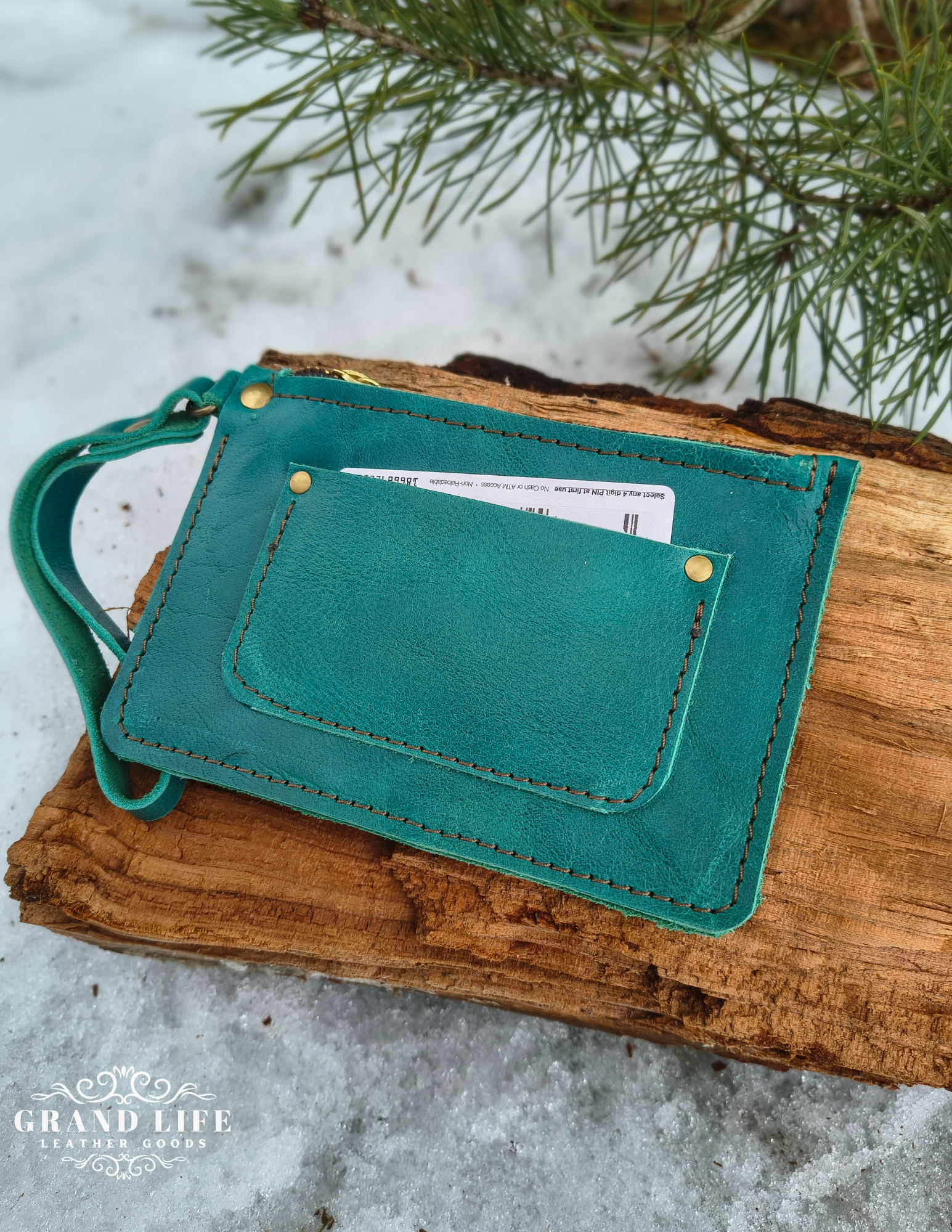 handcrafted leather zip wallet teal detail.png