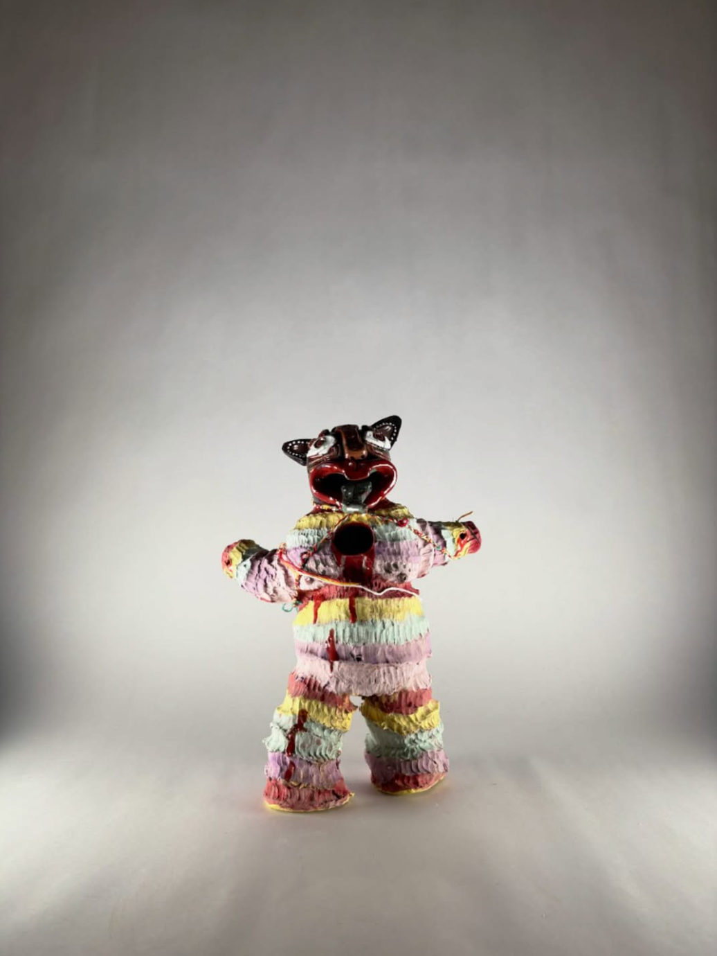 ROMPE LA PIÑATA CARAJO!!! 15 x 32 x 10 cm terracotta glaze and underglaze with wool, 2025​