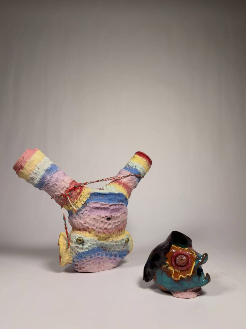 Rompe la Pinata #2, terracotta clay, cotton string , underglaze and glaze, 23 x 26 x 8 cm, 2025​