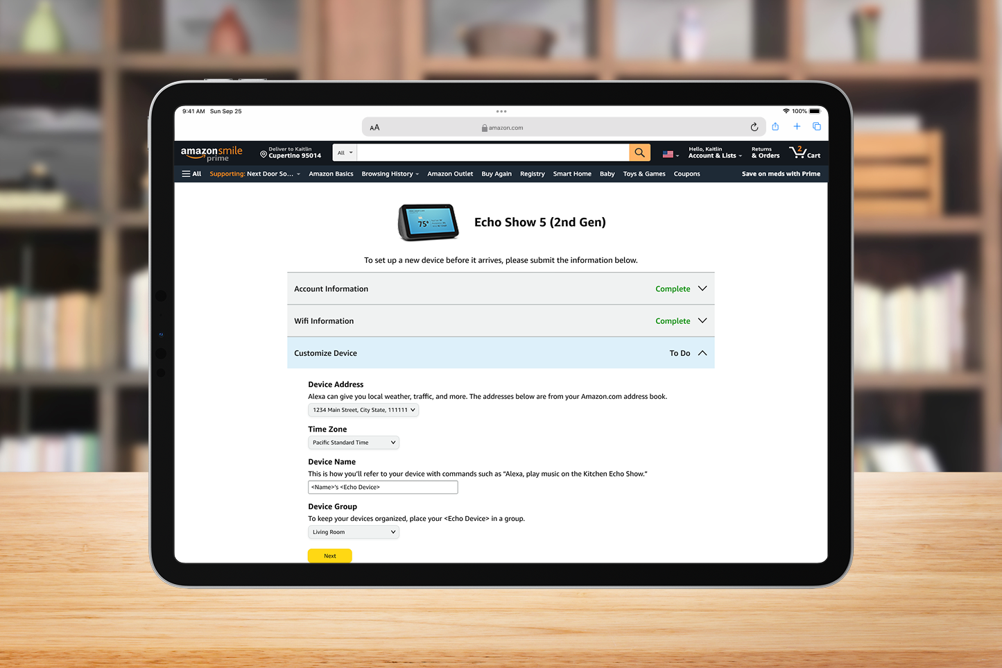 An iPad shows a web page where a customer can enter information to setup a device before it arrives