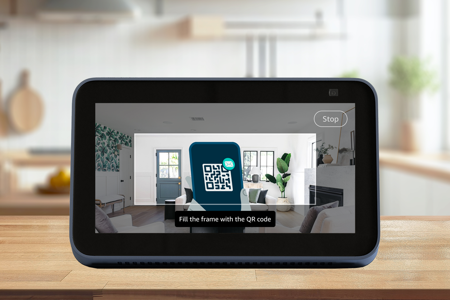 A device sits on a countertop with the camera on, viewing a QR Code.