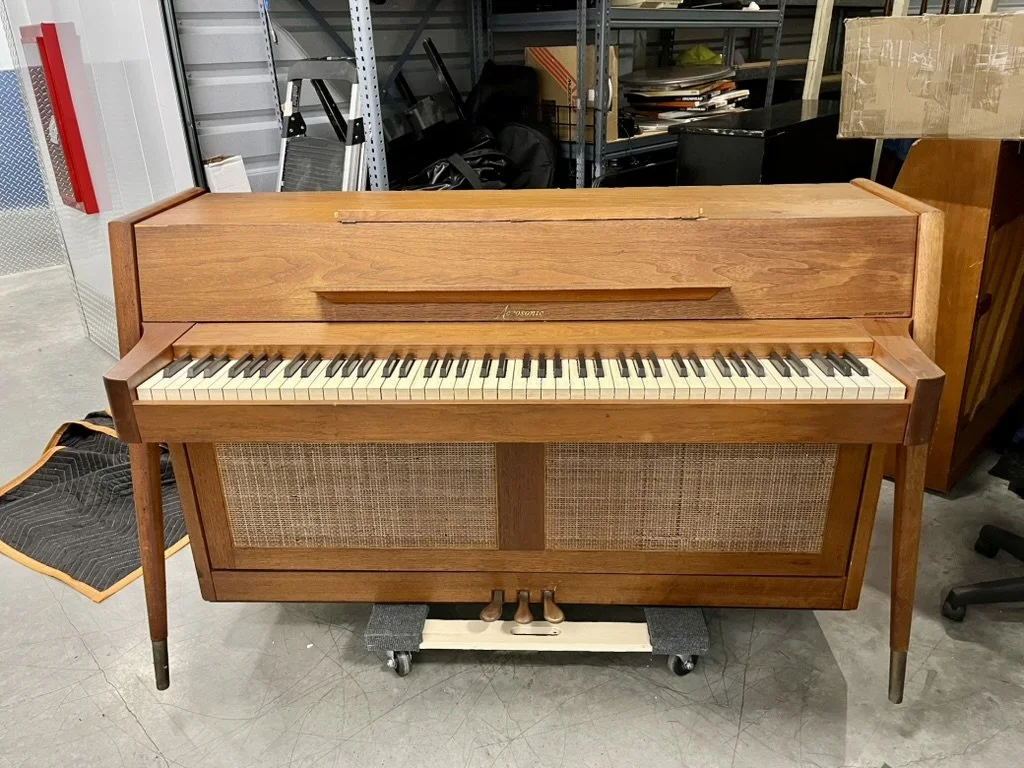 A Baldwin Acrosonic Scandinavian Model 947 spinet piano taken out of storage in preparation for an inspection prior to being shipped to a client.