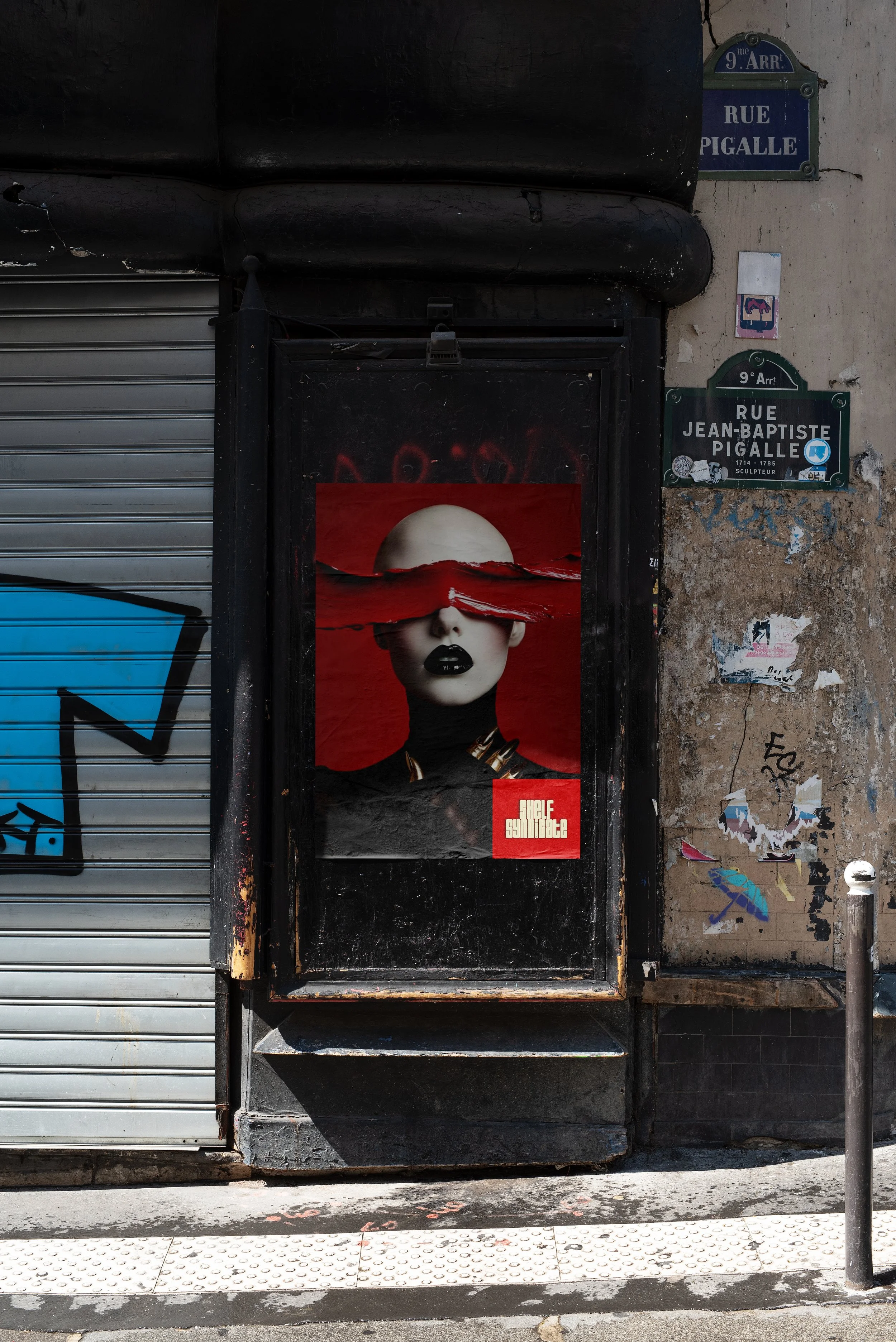 Street scene with a poster of a woman with a surreal red and white face covering her eyes, and street signs in French.