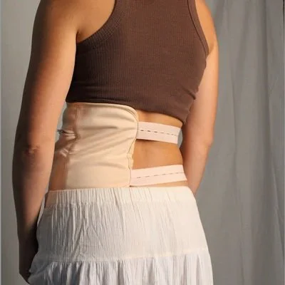 Person_wearing_a_honest_skincare_beige_waist_wrap_with_a_neutral_background.jpeg