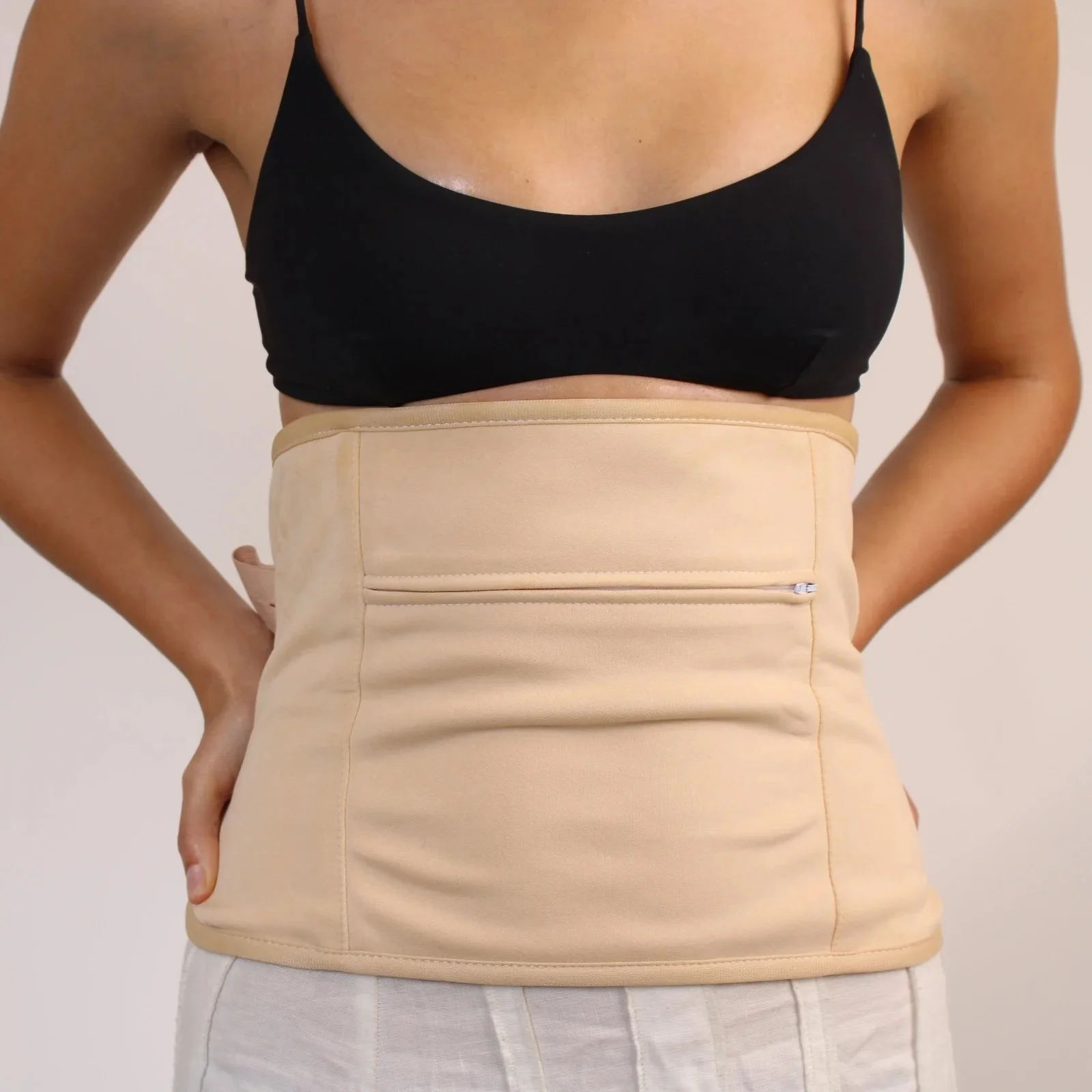 Person_wearing_a_beige_honest_skincare_waist_wrap.jpeg