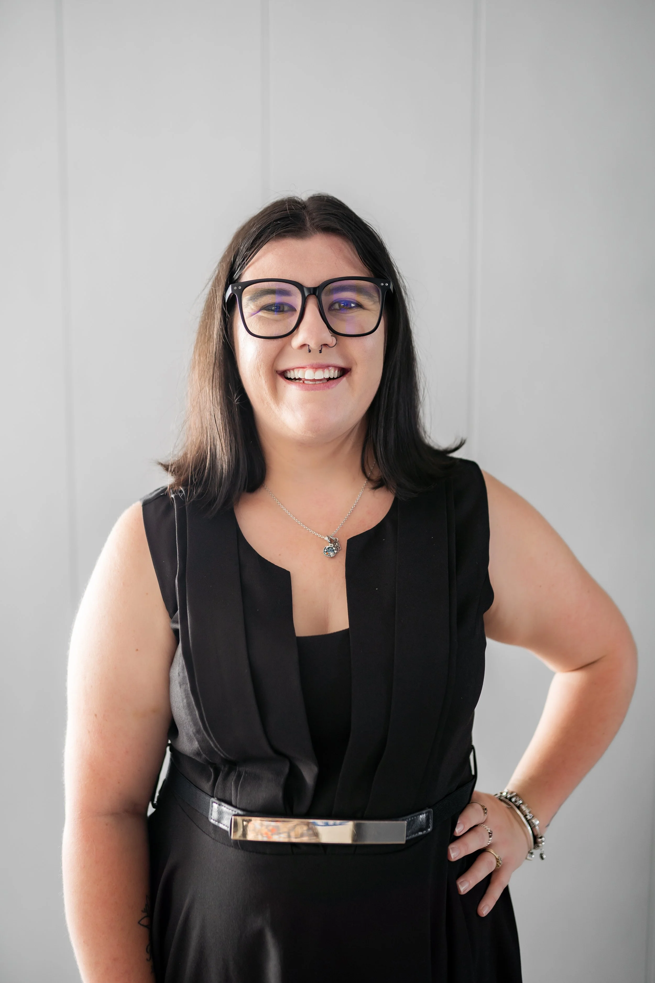 Female with glasses smiling, Schantelle Phillips of Martens Legal, Kedron Brisbane