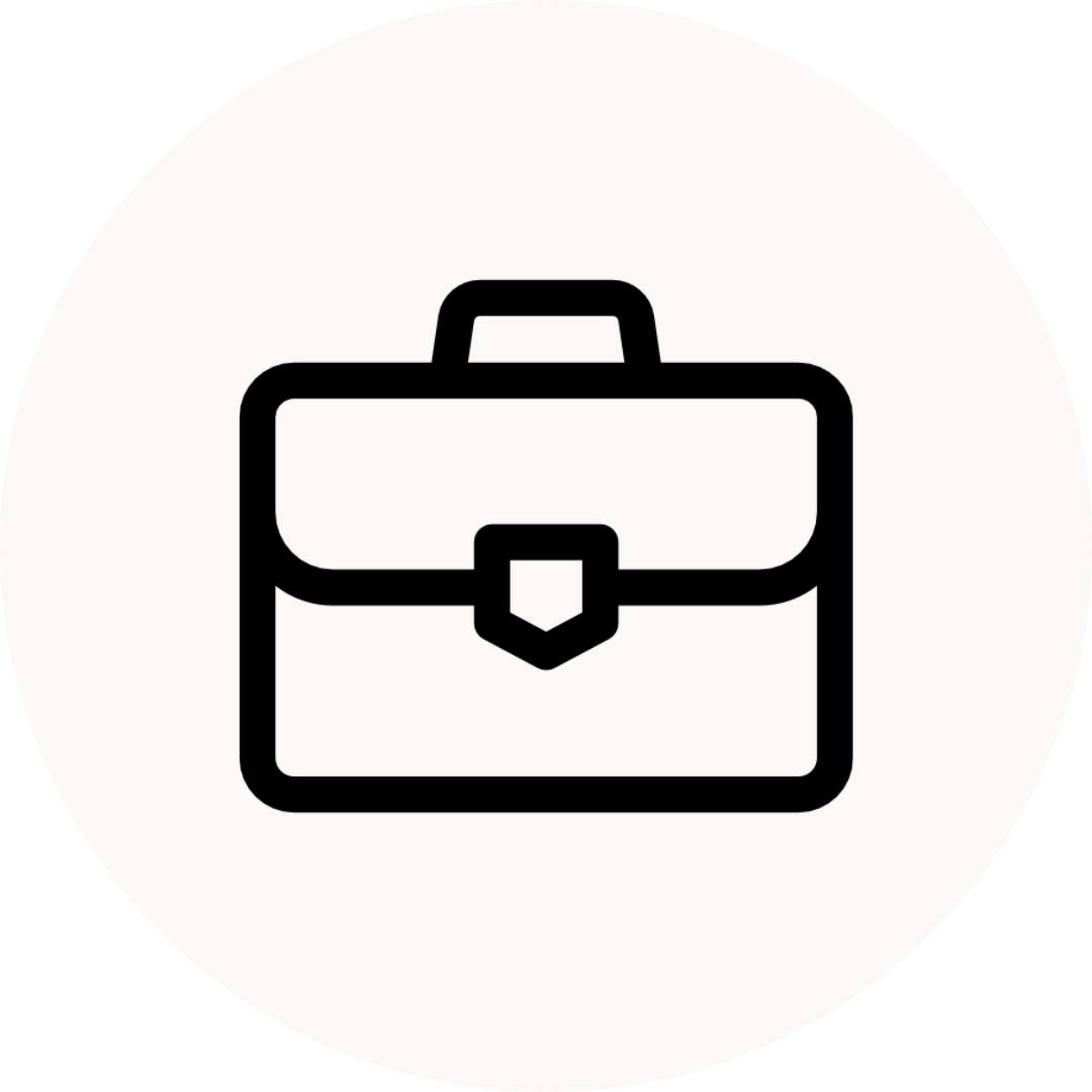 Icon of a briefcase with a handle on top and a latch on the front.