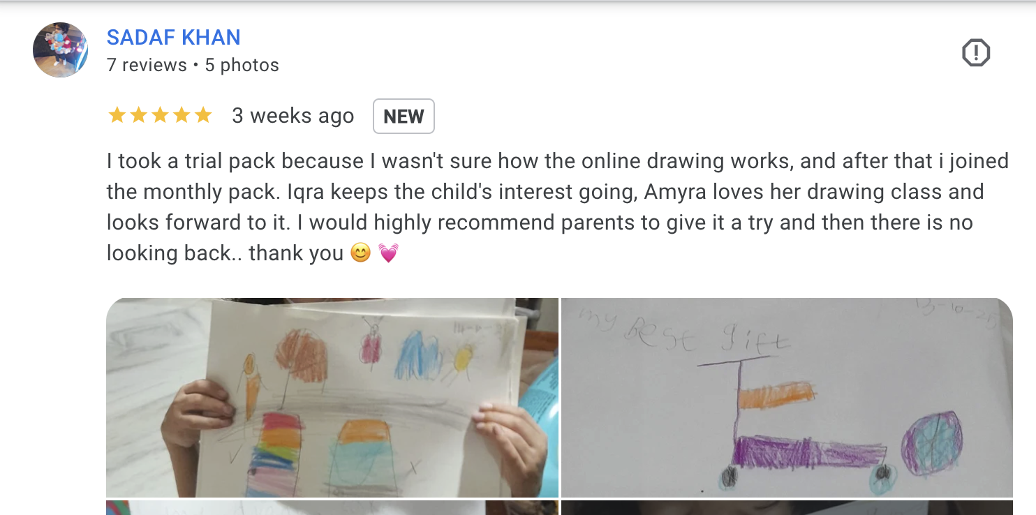 Photo of a child's drawing labeled 'My Rose Gift,' featuring a purple and orange object and some colored circles.