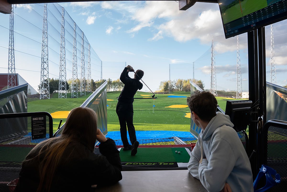 Group of people at driving range