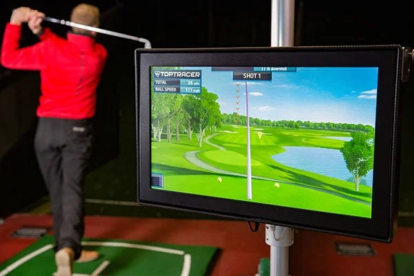 Person having a golf assessment lesson