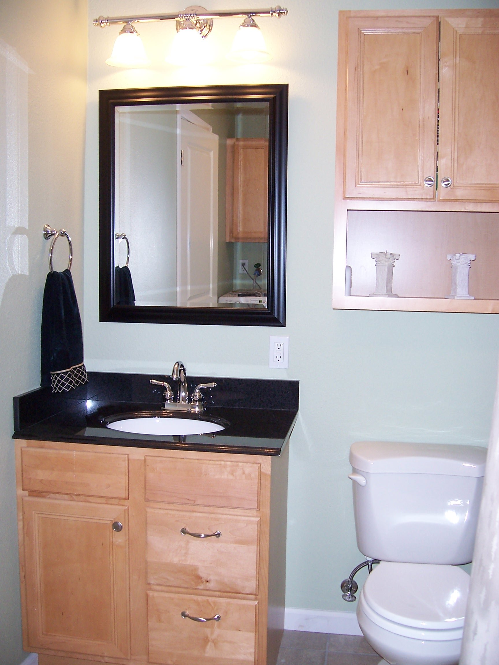 New cabinetry makes this bathroom feel bigger with improved functionality. 