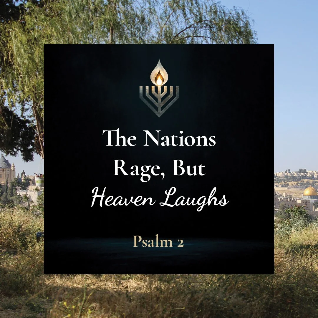 A graphic overlay with a menorah and flame logo at the top, commemorative text reading 'The Nations Rage, But Heaven Laughs,' and a citation to Psalm 2, set against a blurred outdoor landscape background with trees and a cityscape.