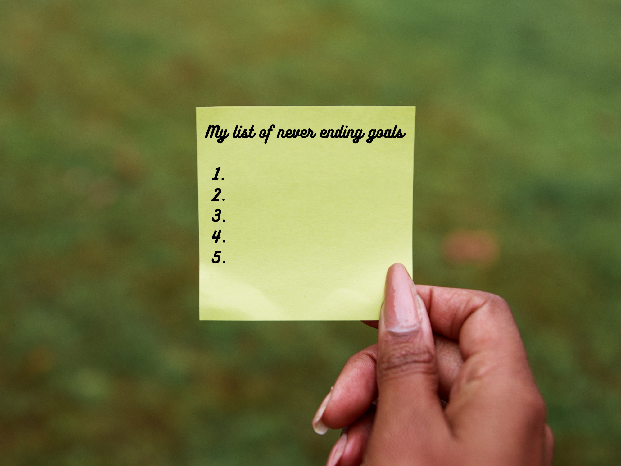 Black woman holding a yellow post it note