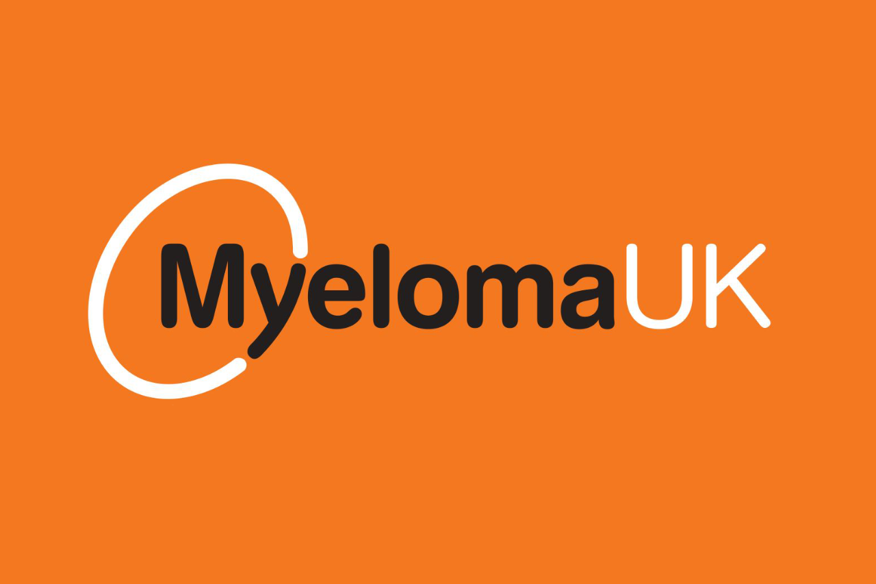 Myeloma UK logo on an orange background with black and white text and design elements.