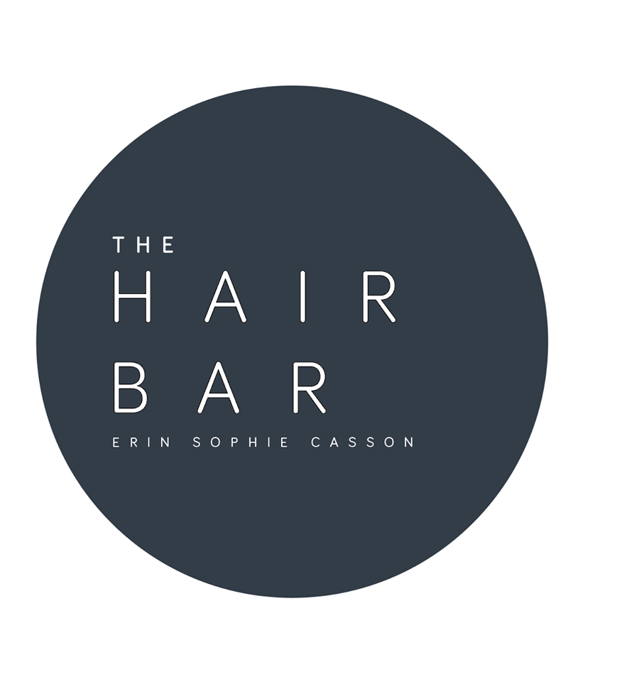 Logo of The Hair Bar by Erin Sophie Casson with the text arranged in a circle in white letters on a dark background.