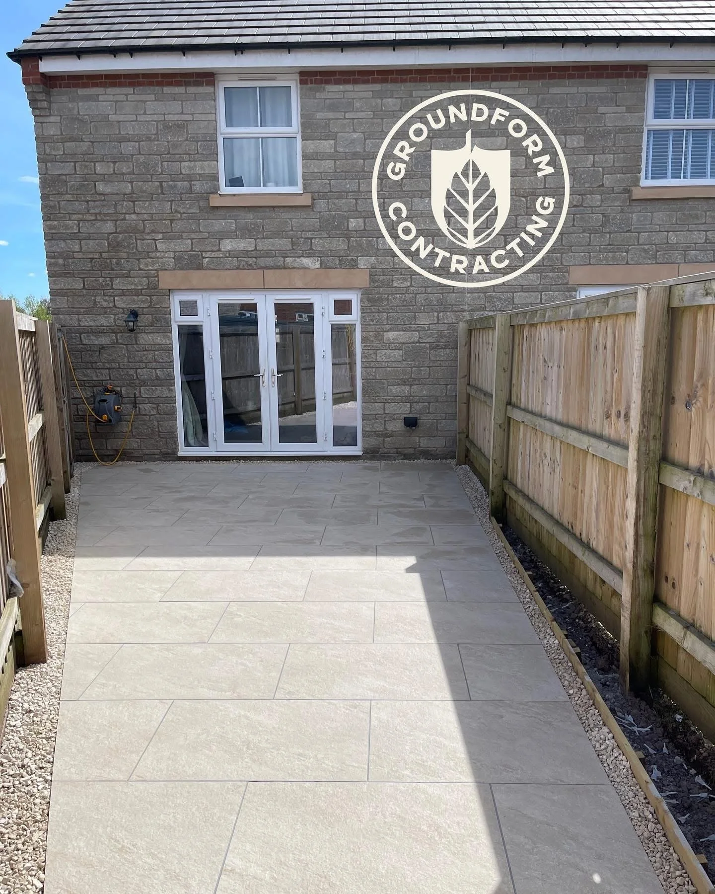 Oranssi technician working on a roof project