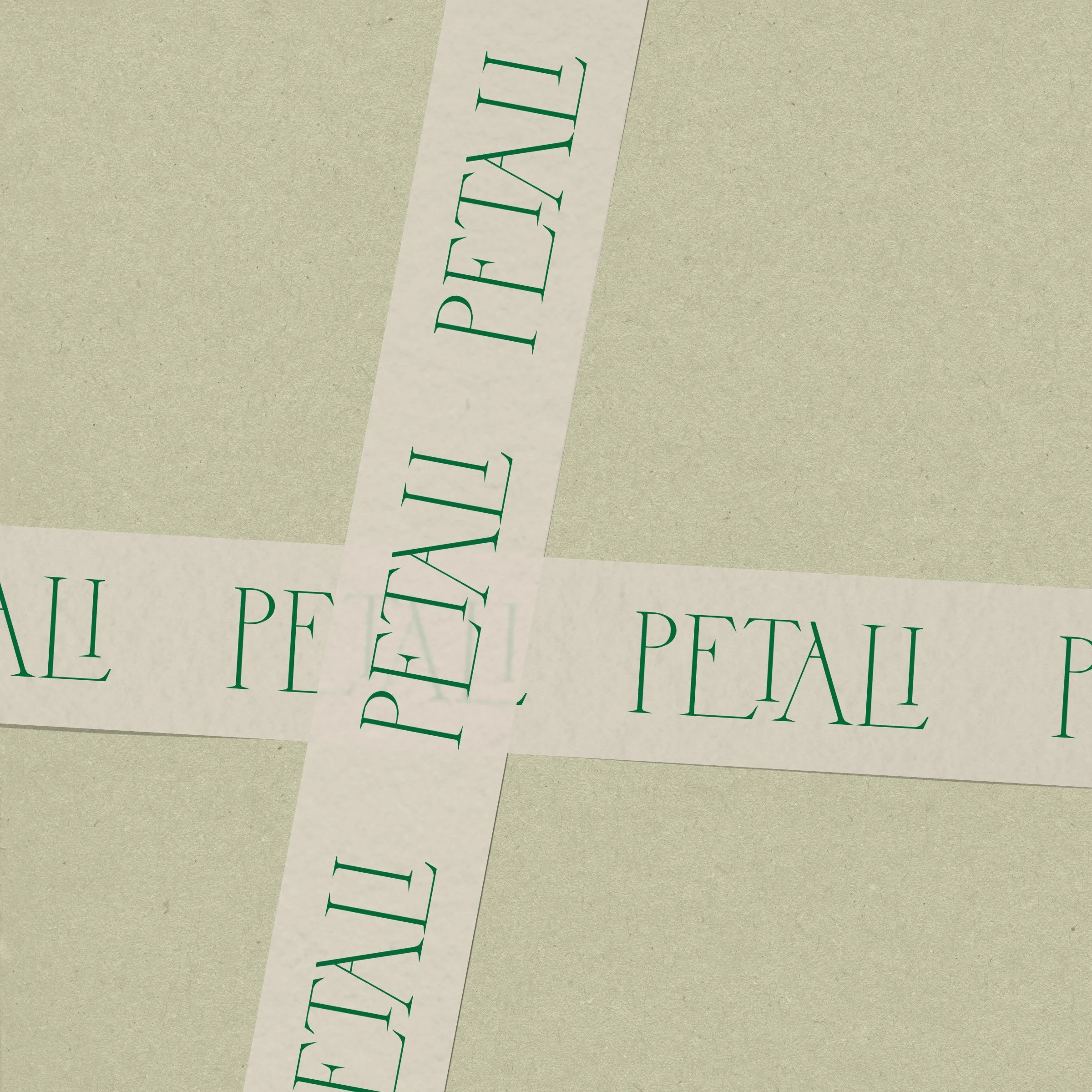 Multiple pieces of tape with the word 'PETALI' written on them, arranged in a crisscross pattern on a green textured background.