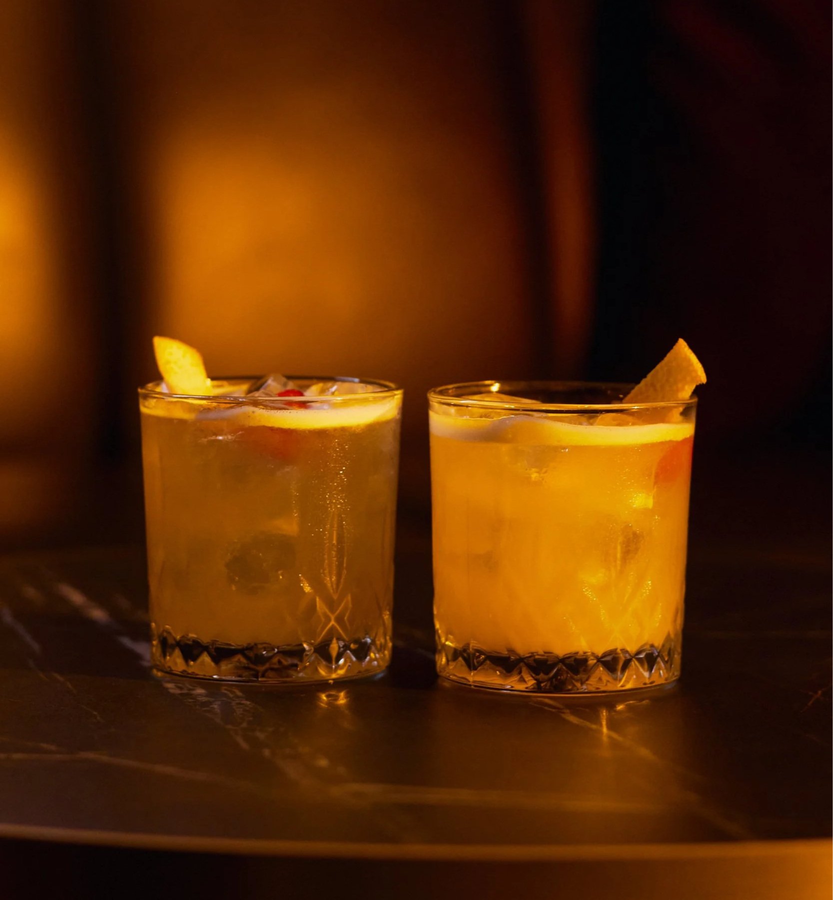 A martini cocktail with olives