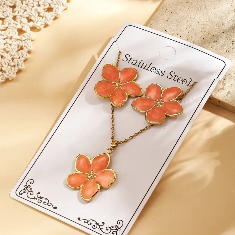 Ensemble collier et boucles d'oreilles