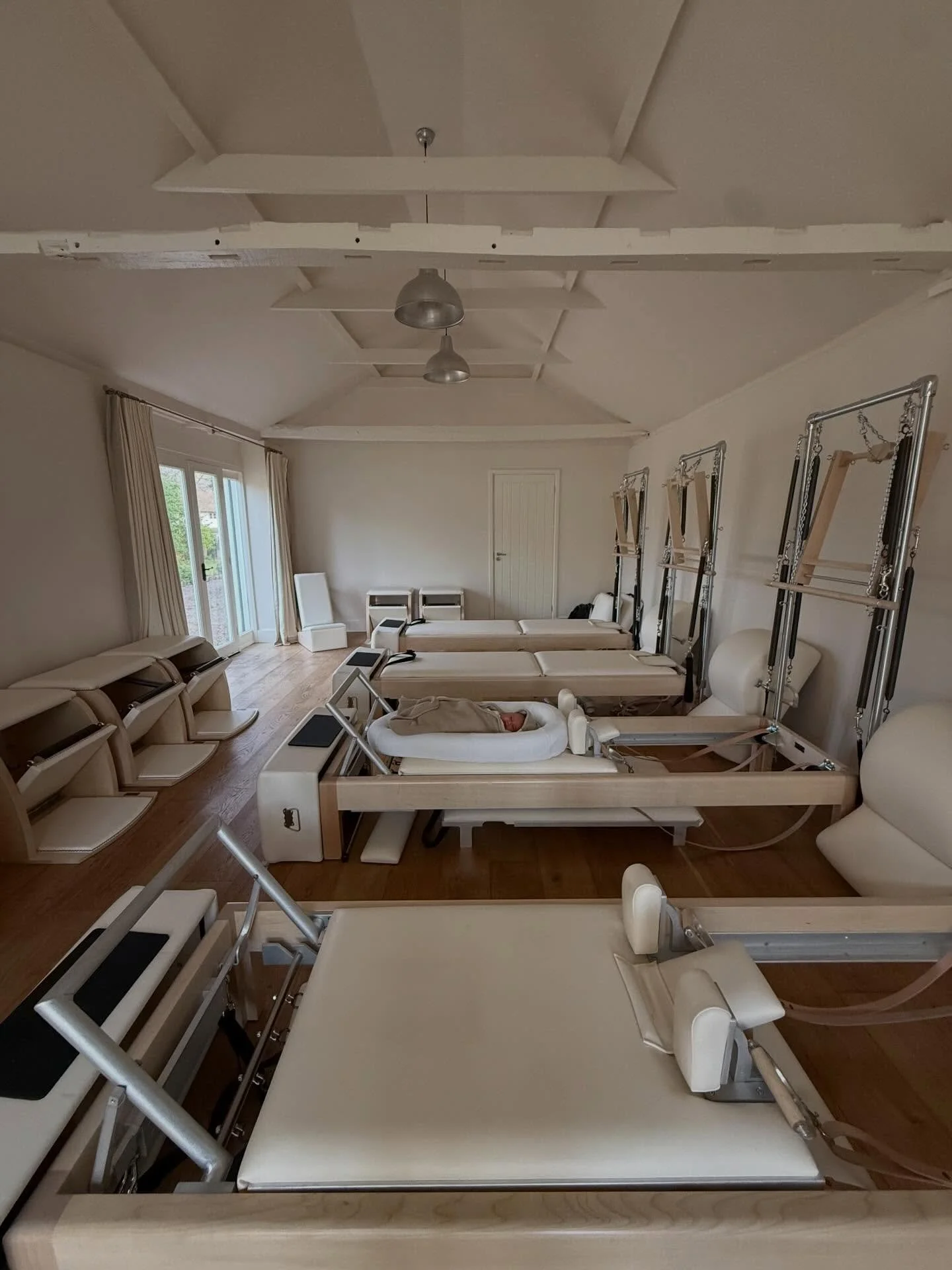 Delilah keeping the reformer beds warm until we reopen in the Summer ☀️