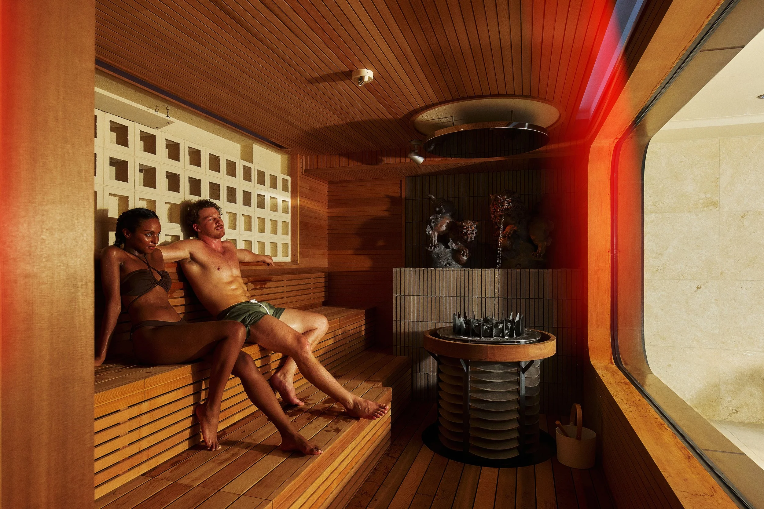 Guests relaxing in hotel sauna