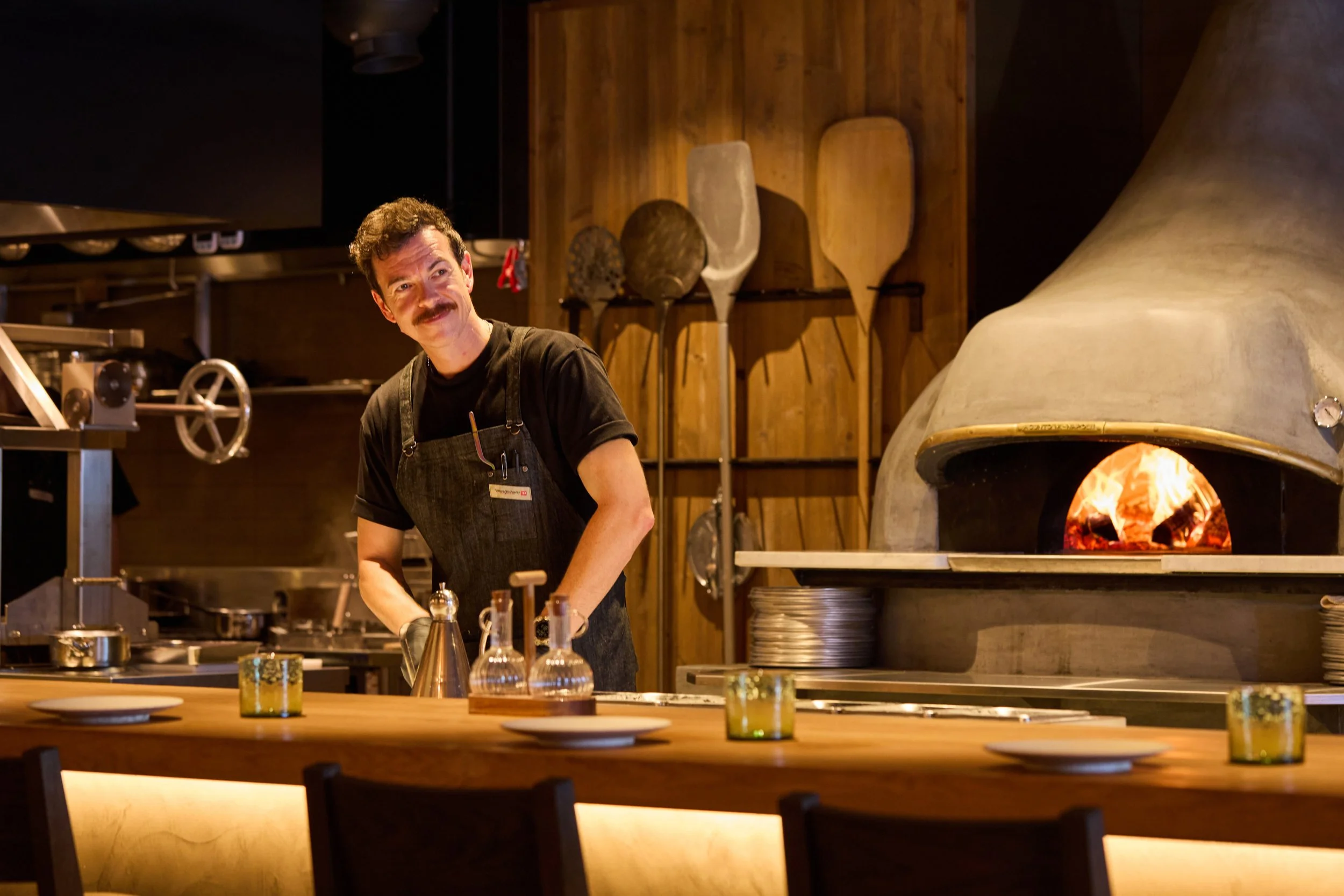 Chef preparing food in hotel restaurant kitchen