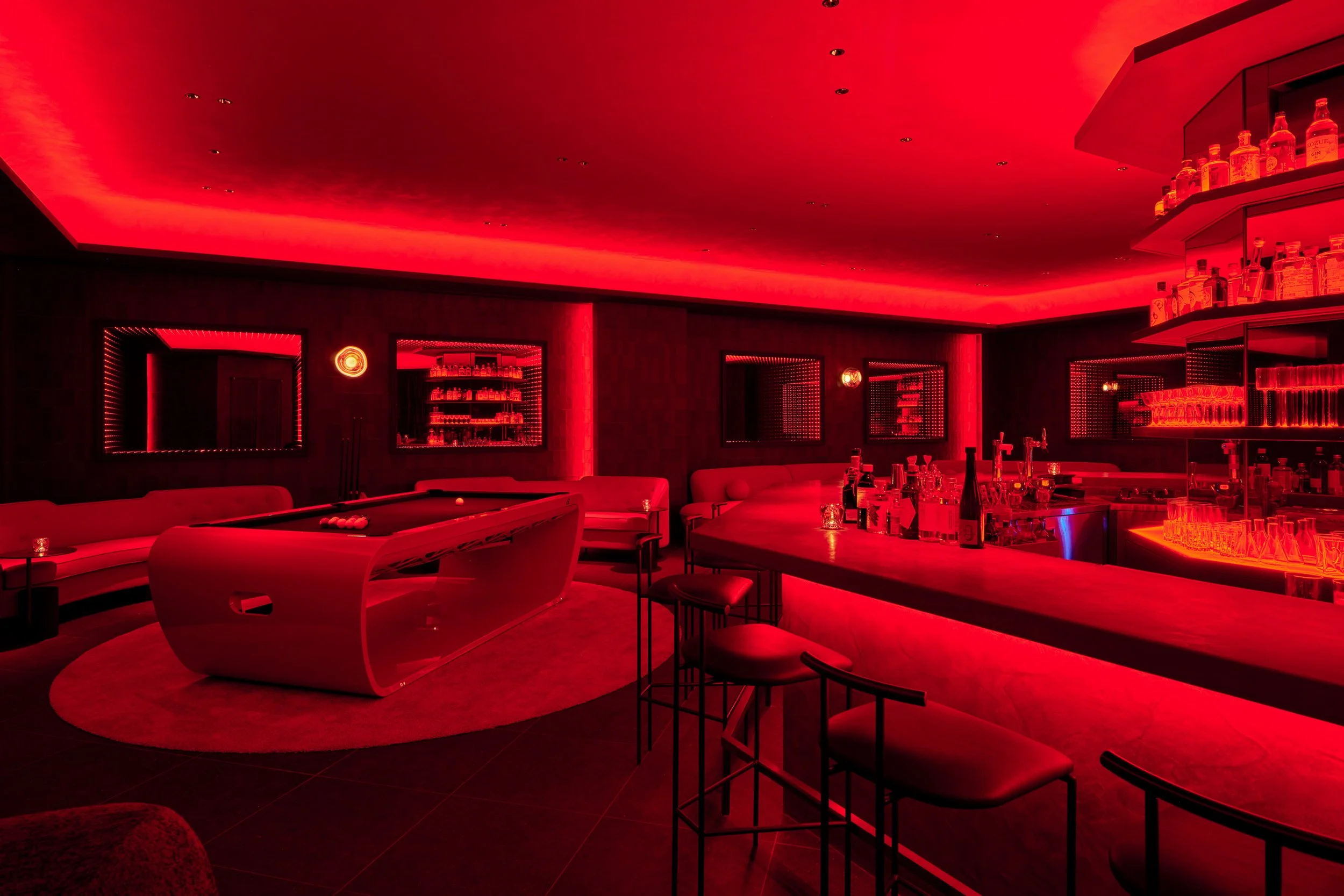 Hotel bar interior with ambient red lighting