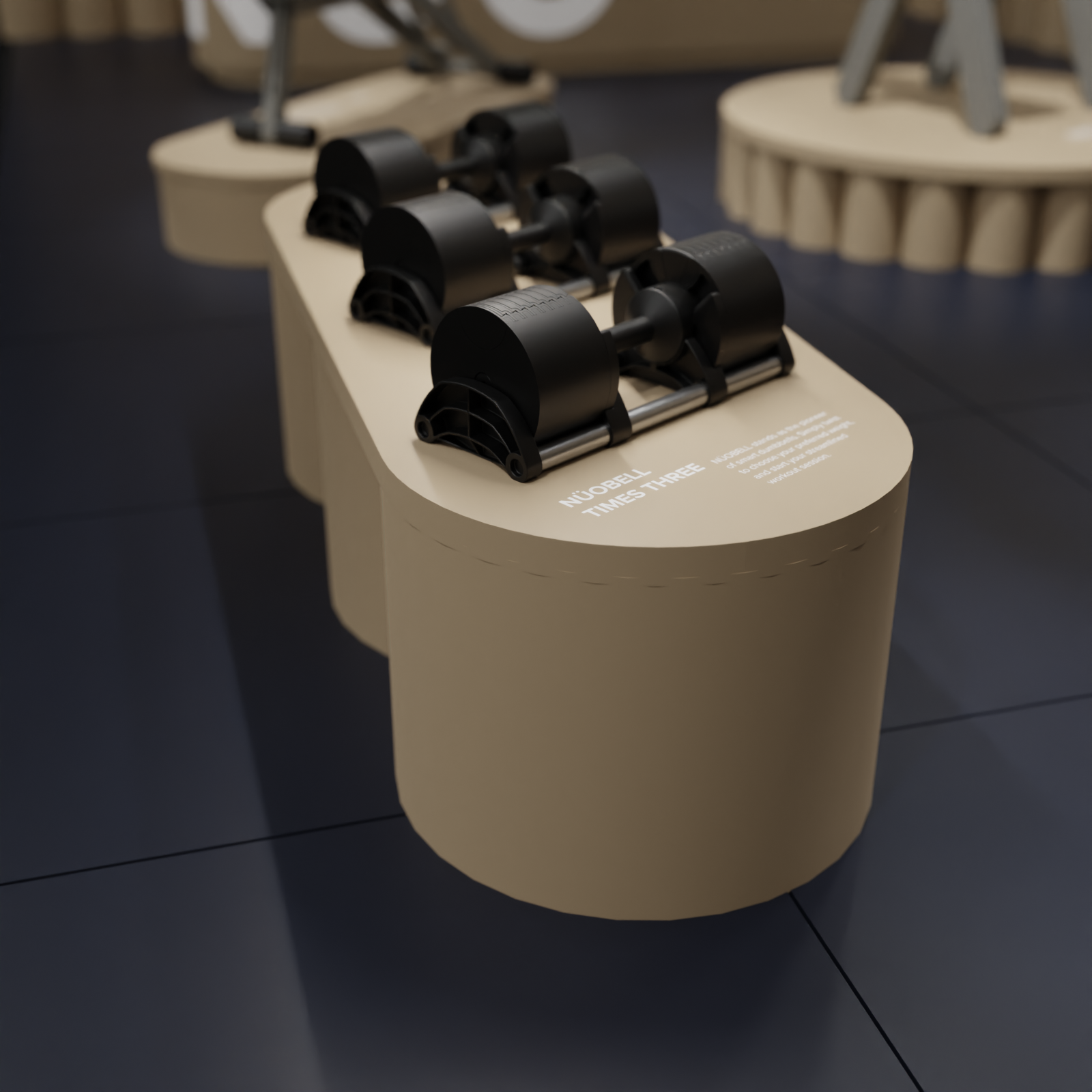Modern black ab roller exercise equipment displayed on a beige oval-shaped stand in a store.