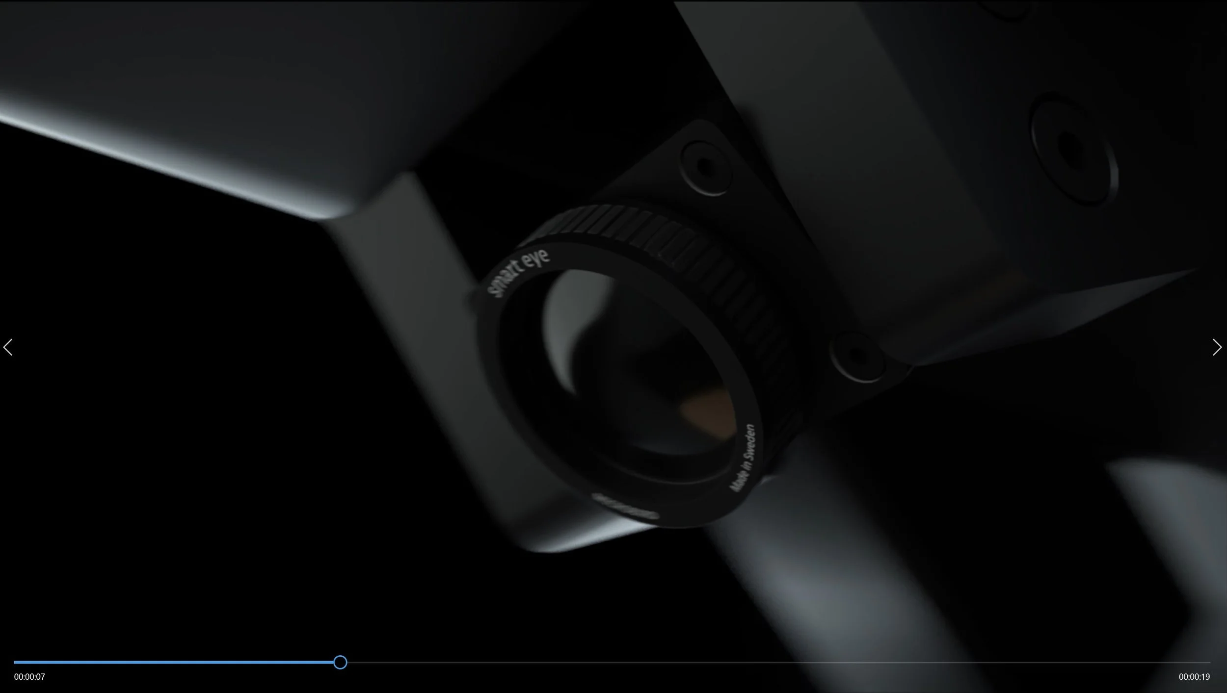 Close-up of a microscope's eyepiece labeled 'smart eye' and 'Made in Sweden' in a dark environment.