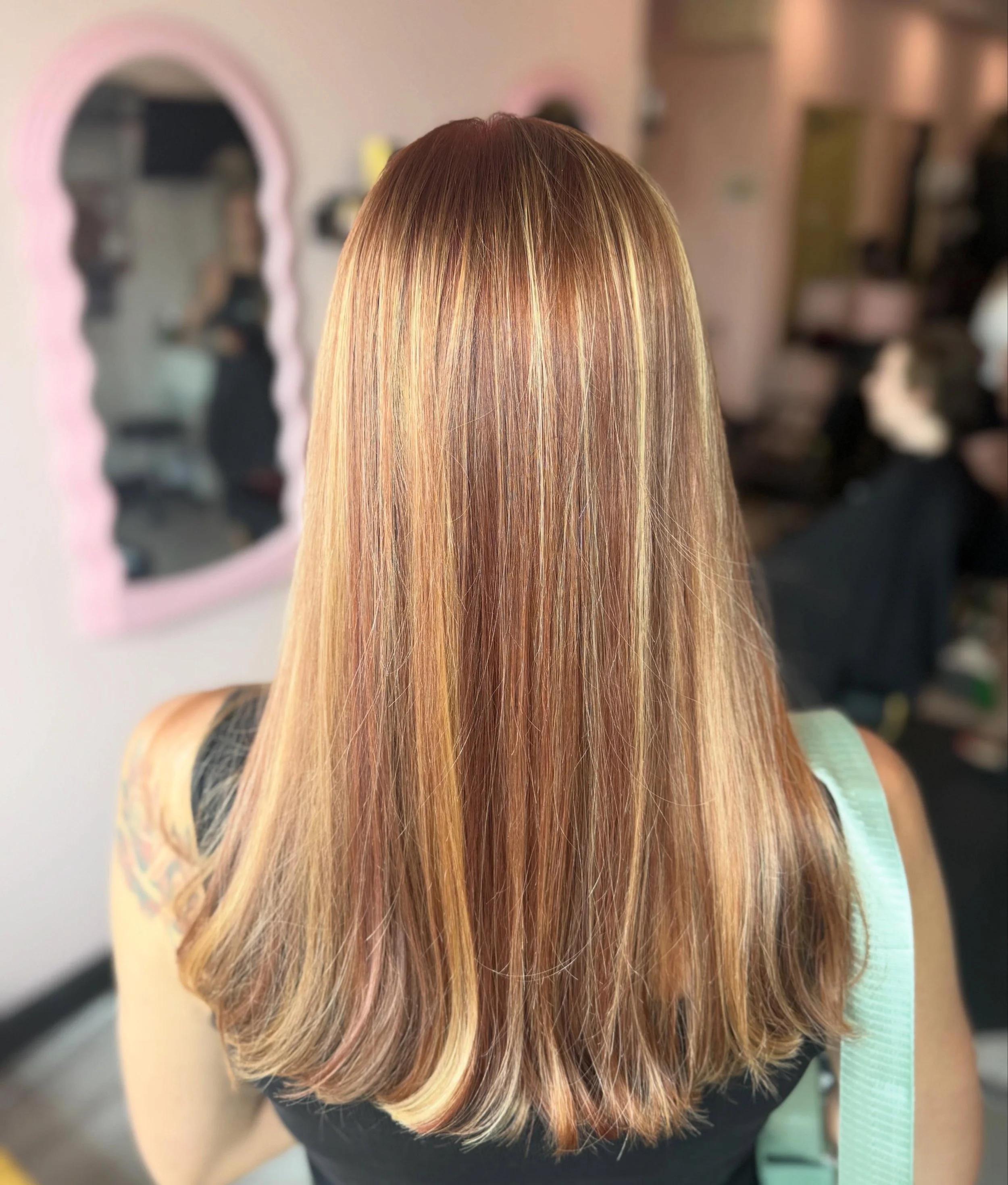 A fresh new look for this beautiful mama ✨

Warm copper, rich red, and soft blonde tones blended together for the perfect dimensional glow. ❤️🧡✨

Nothing beats hair that makes you feel confident, refreshed, and ready to take on the world. 🌟
Stylist