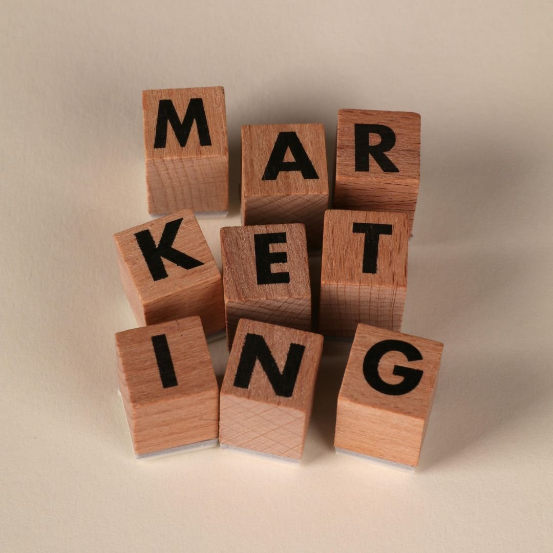 wooden blocks that spell out the word marketing