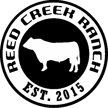 Logo of Reed Creek Ranch featuring a white silhouette of a Bull inside a black and white circular emblem, with the text 'Reed Creek Ranch' and 'EST. 2015' around the circle.