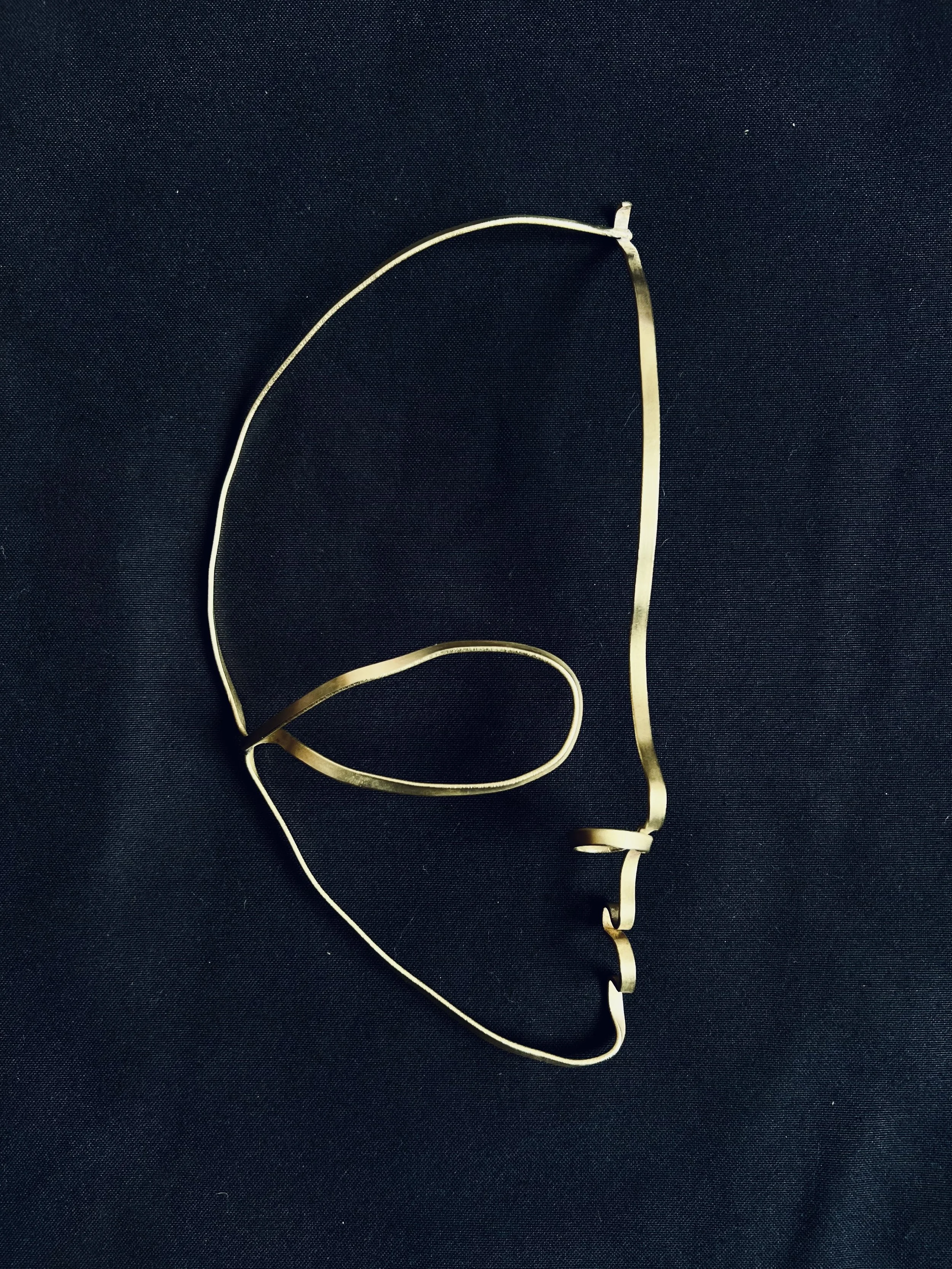 Uso Jicho

Year: 2018
Artist: Theresia Kyalo
Medium: Jewellery
Dimensions: 20 cm across the face
Material: Brass/ Gold plate 
Edition : Limited Edition
Certificate: Accompanied by Certificate of Authenticity
Price: Available upon request
