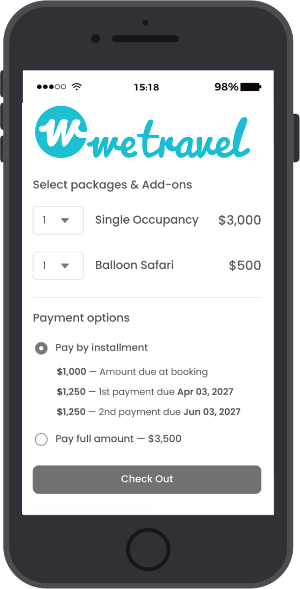 Mobile app screen for We Travel with travel package options, including single occupancy and balloon safari, and payment plan choices.