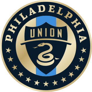 The logo of the Philadelphia Union soccer team featuring a shield with a snake and the team name.