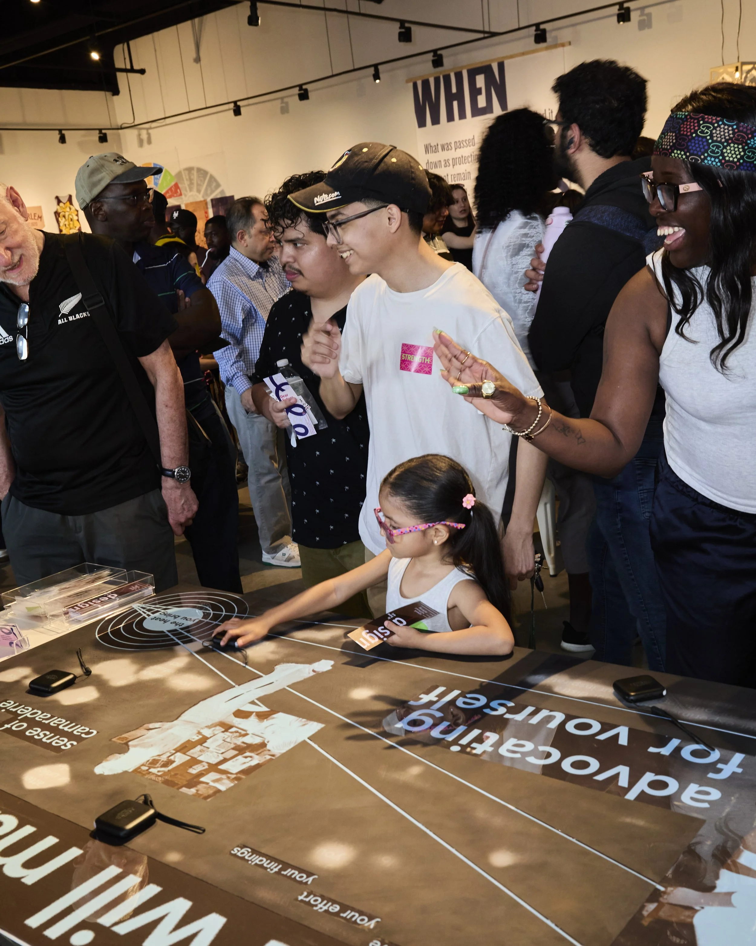 People interactive with the piece