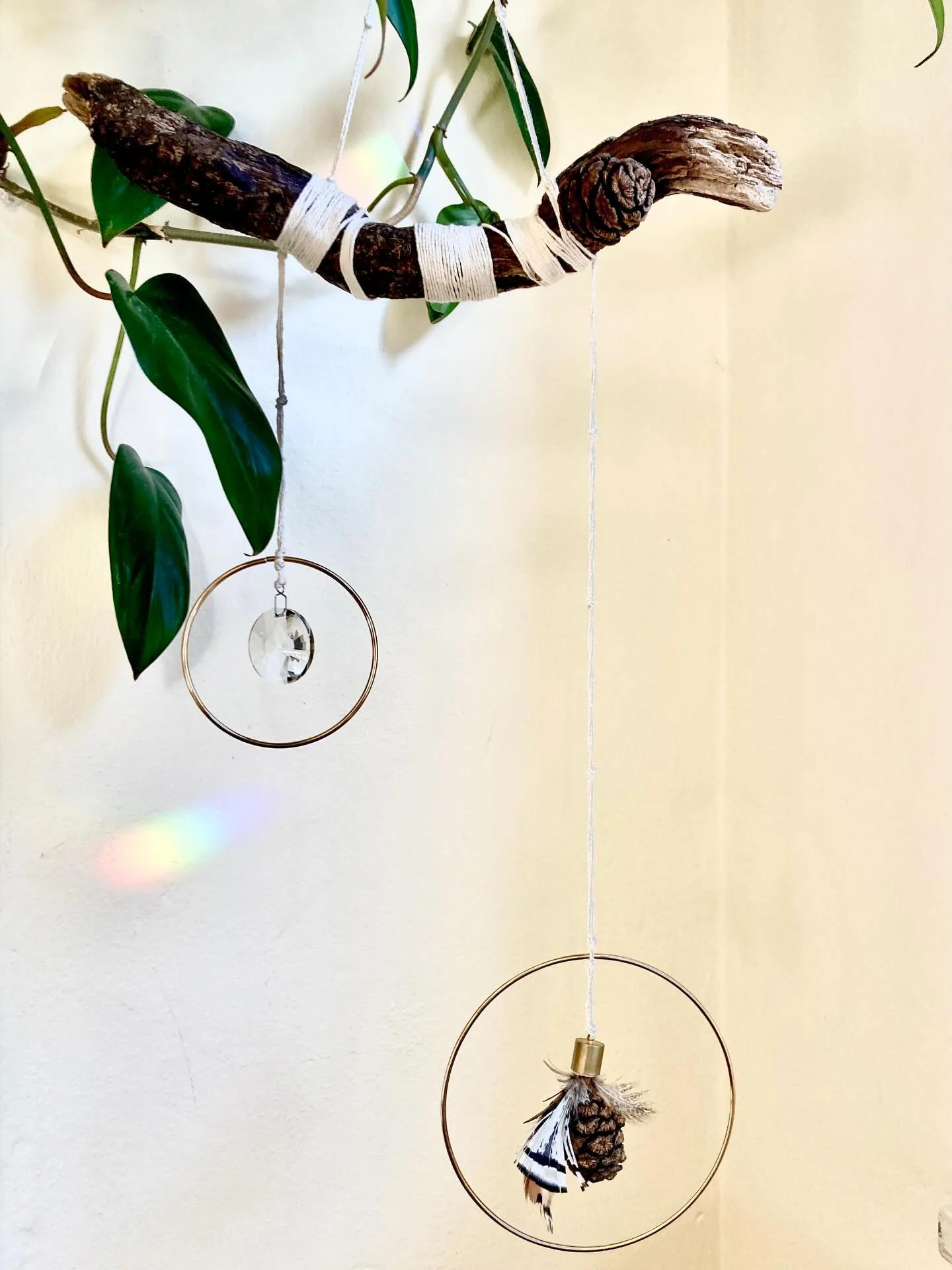 Spirit Tool: a hangin altar to the elements; living intentions that thread the wisdom of the earth&rsquo;s elements into a sacred object; a refraction that renders the souls radiance visible in shattered light.
I create each piece by incorporating el