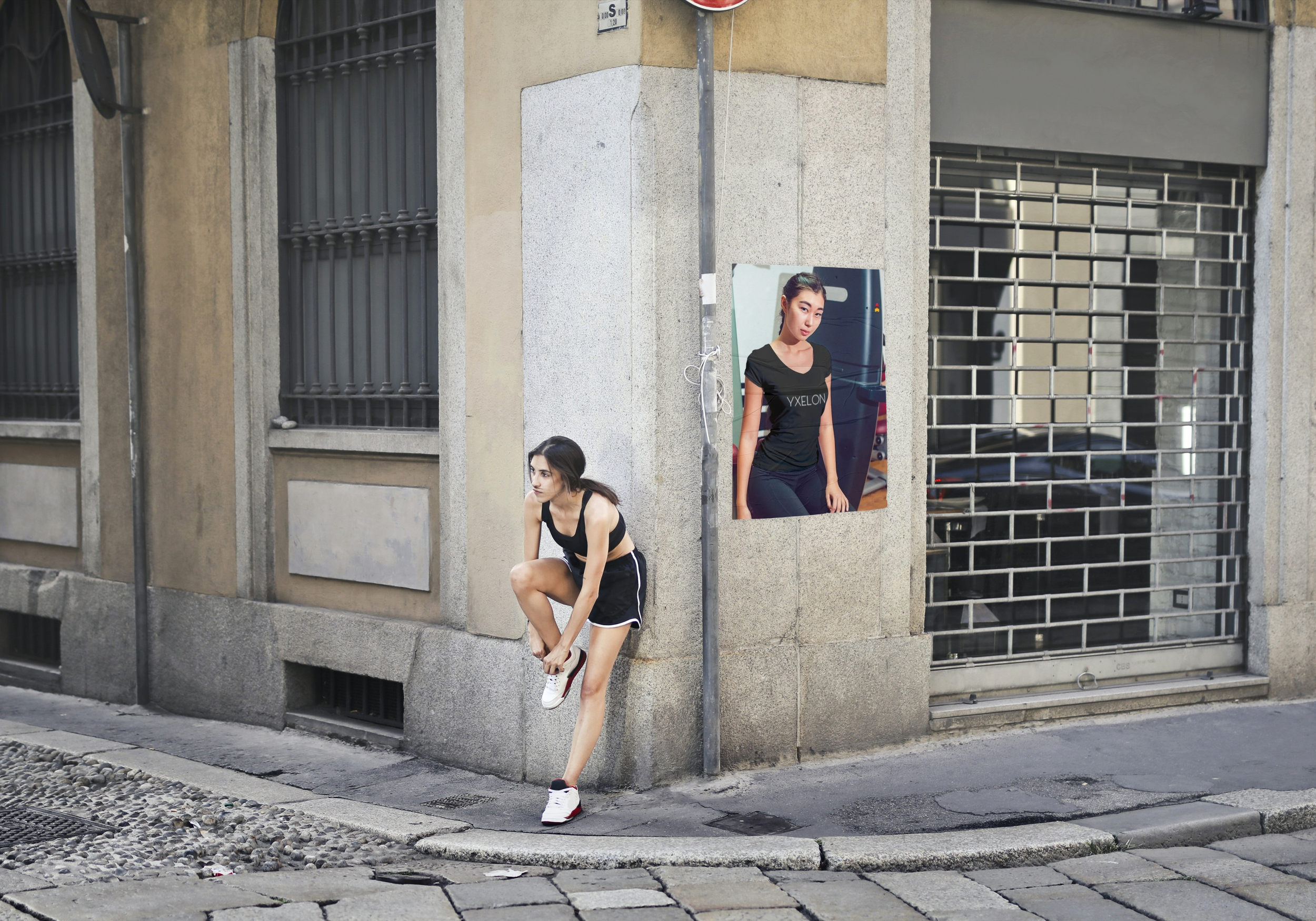 Street poster of a woman wearing black color "The TrainGym" from stYle Collections by YXELON.